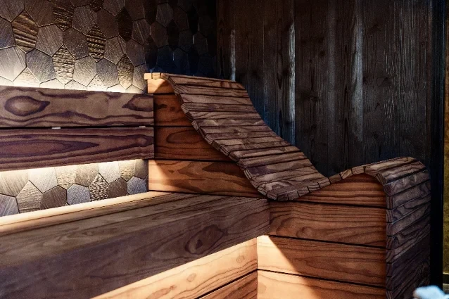 Wooden sauna bench with soft backlighting