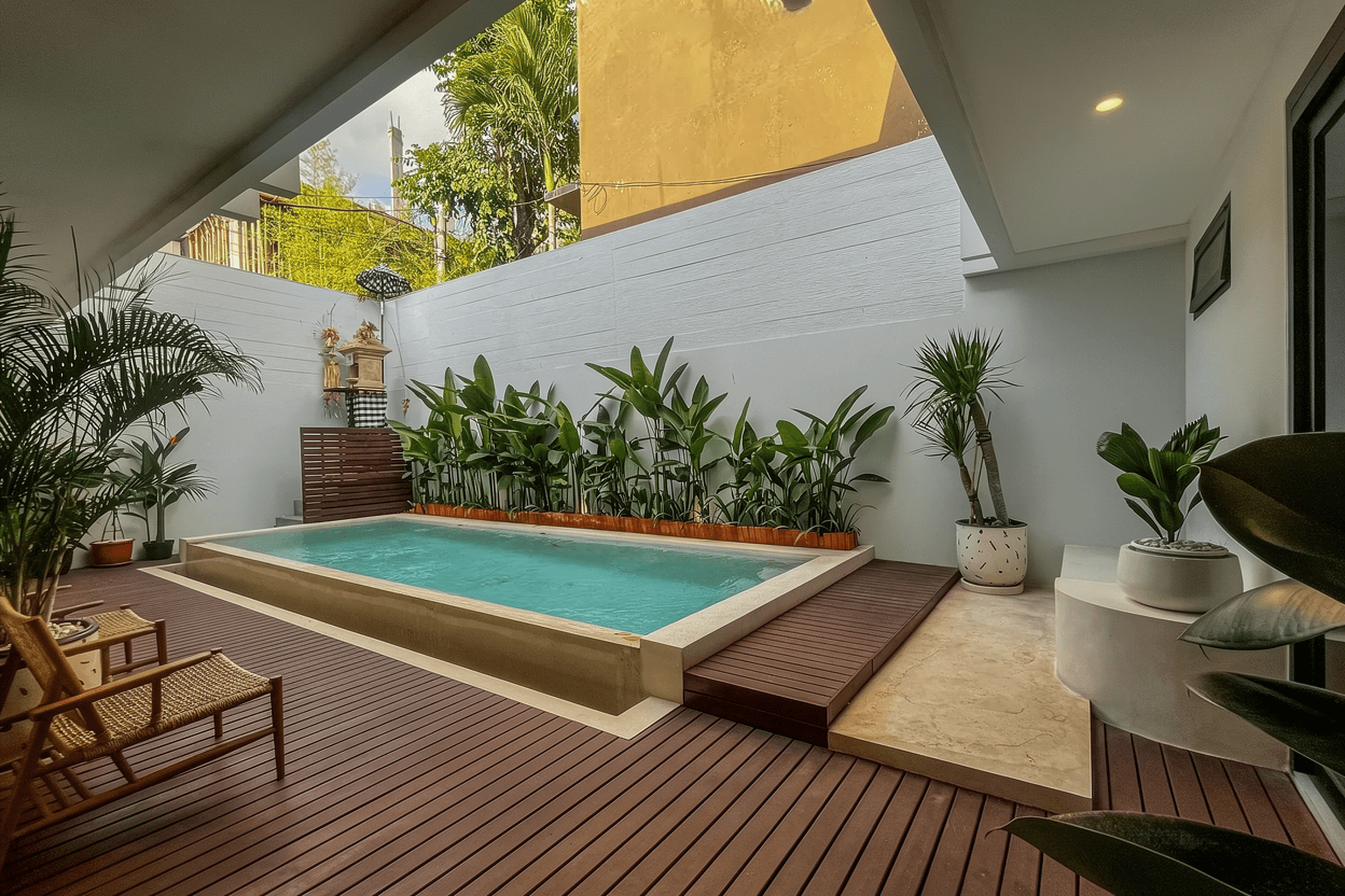 Tropical outdoor pool area in Jimbaran. Real estate agent expertise for high-ROI Bali property investments.