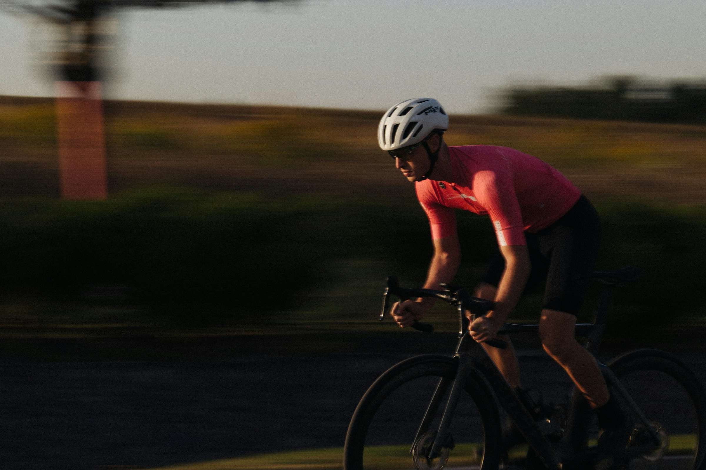 man in black shirt riding on bicycle