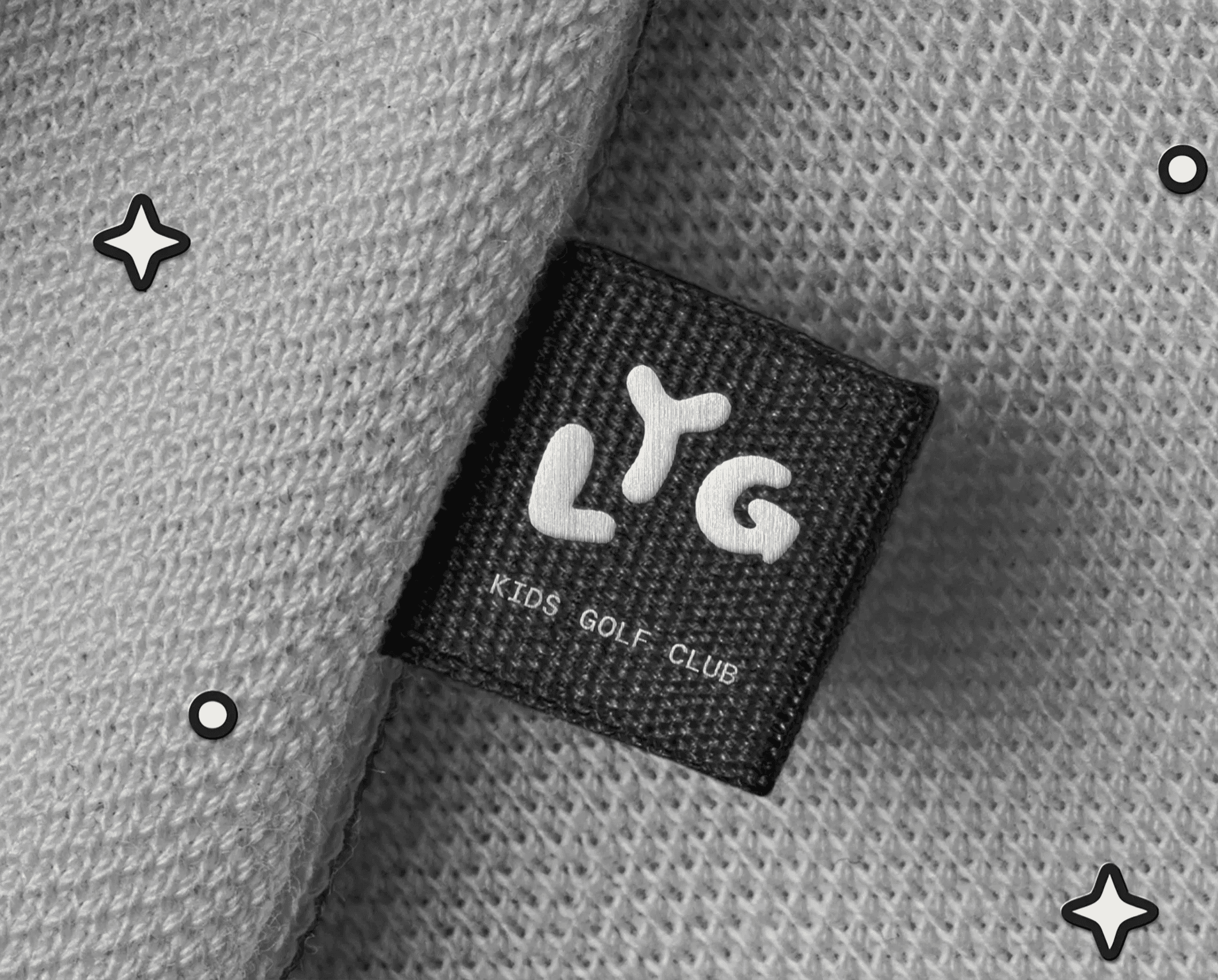 Liteyear Golf woven LYG label sewn onto gray fabric