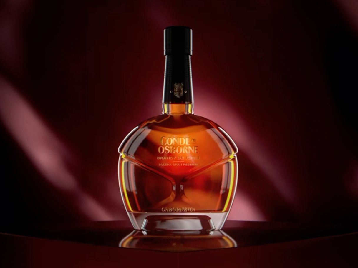 Rustic cabin in a golden field at sunset