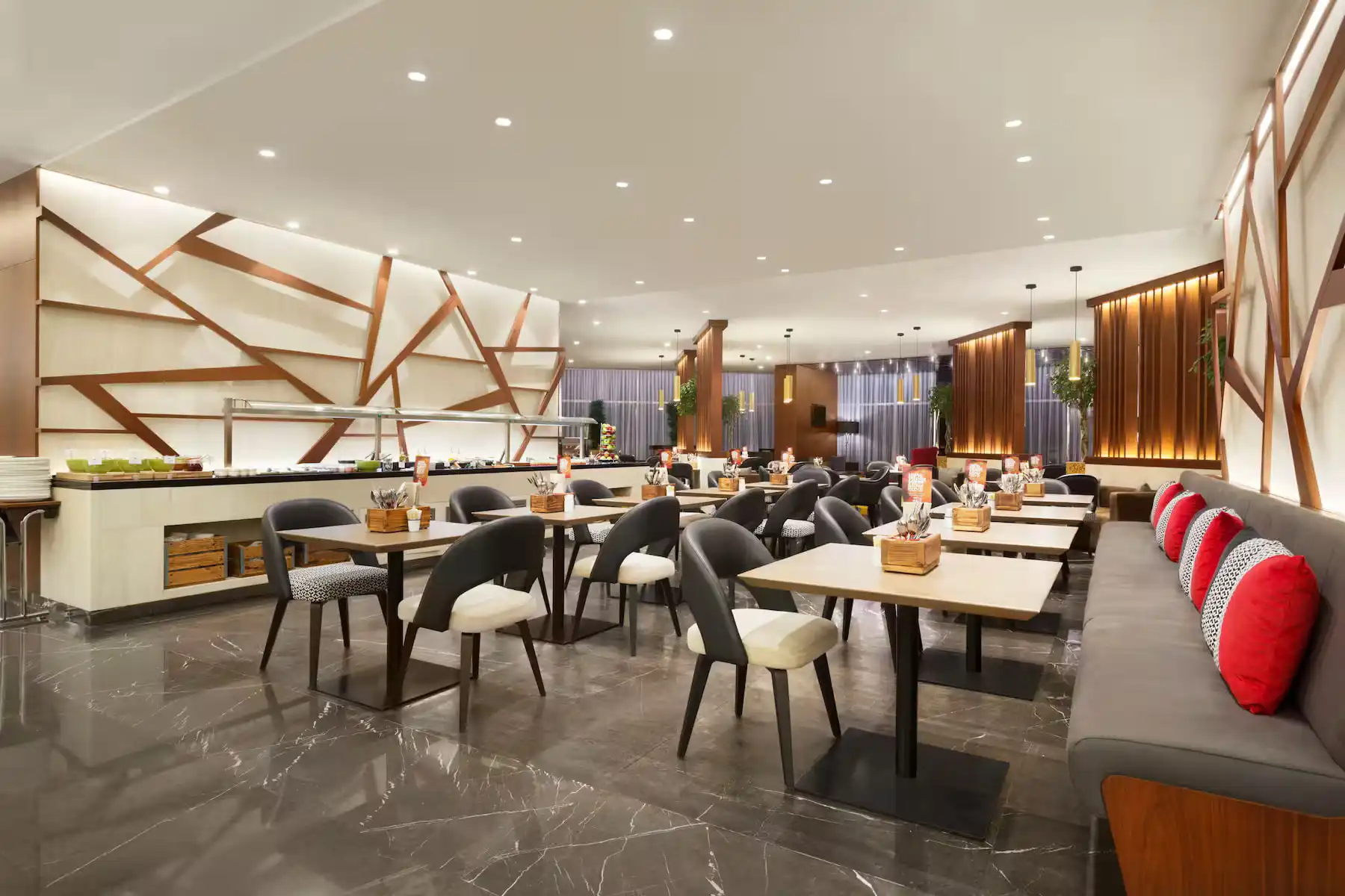 The restaurant interior at TRYP by Wyndham Dubai, a pet-friendly hotel in Barsha Heights