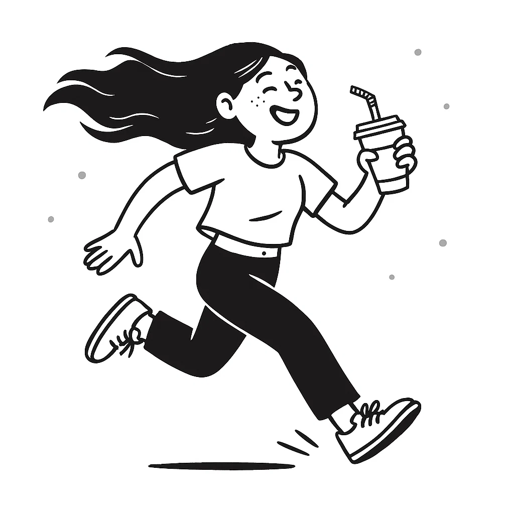 clear drinking glass with coffee on top of white table