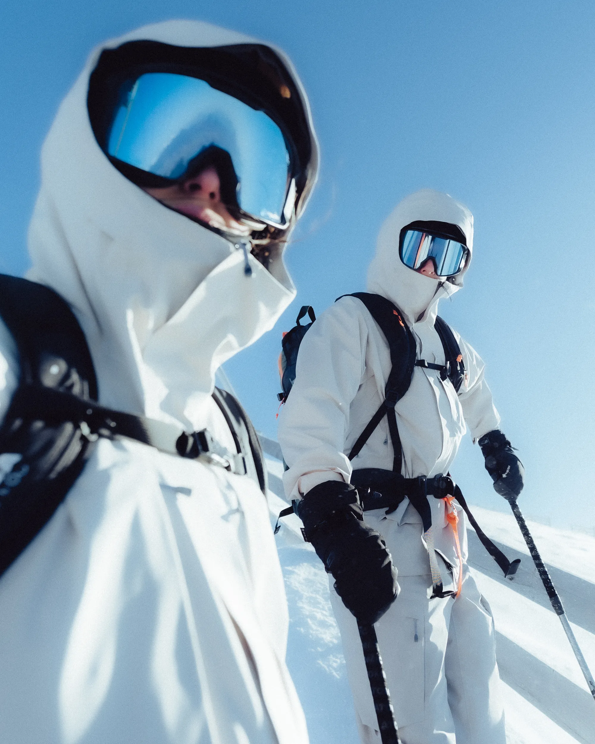 portrait of two skiers.