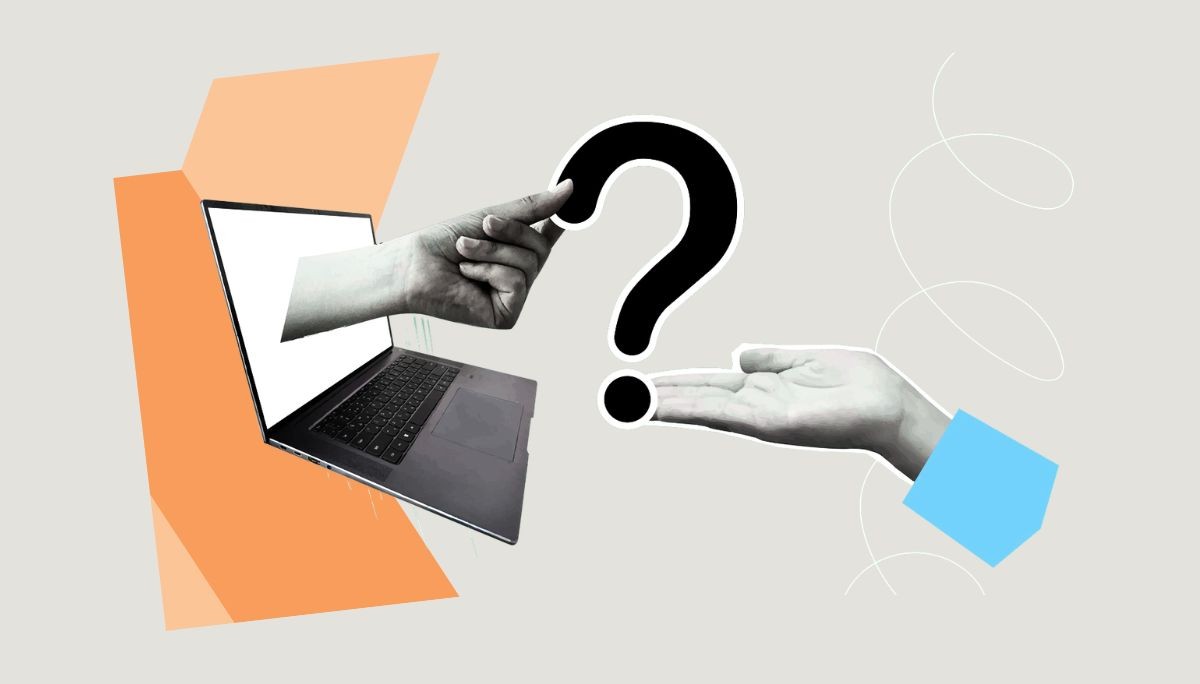 Laptop with question mark between two hands, symbolizing front end developer interview questions.