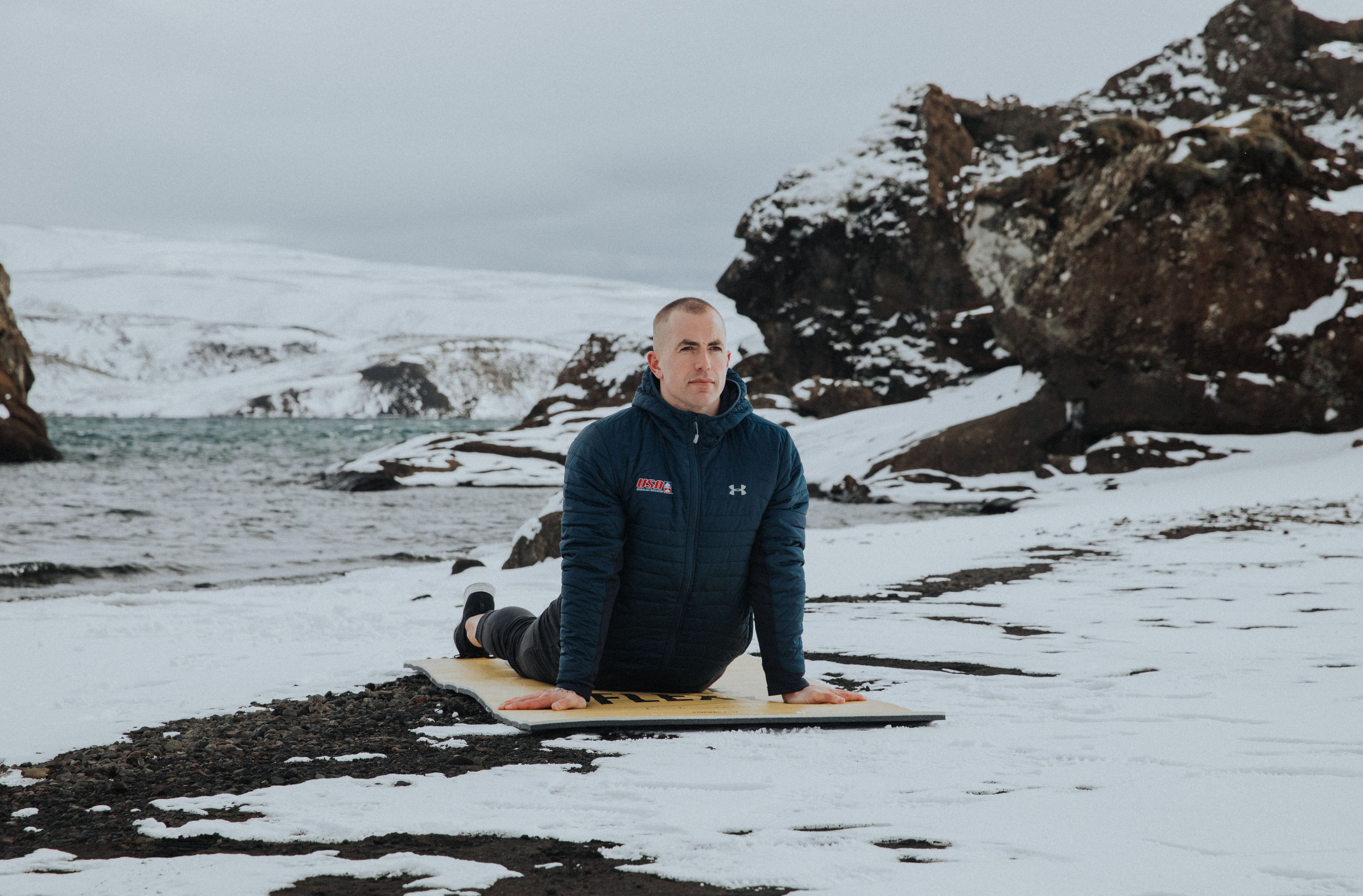 man training in ice - How to Train Like an Athlete