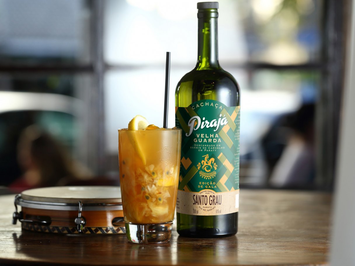 Rustic cabin in a golden field at sunset
