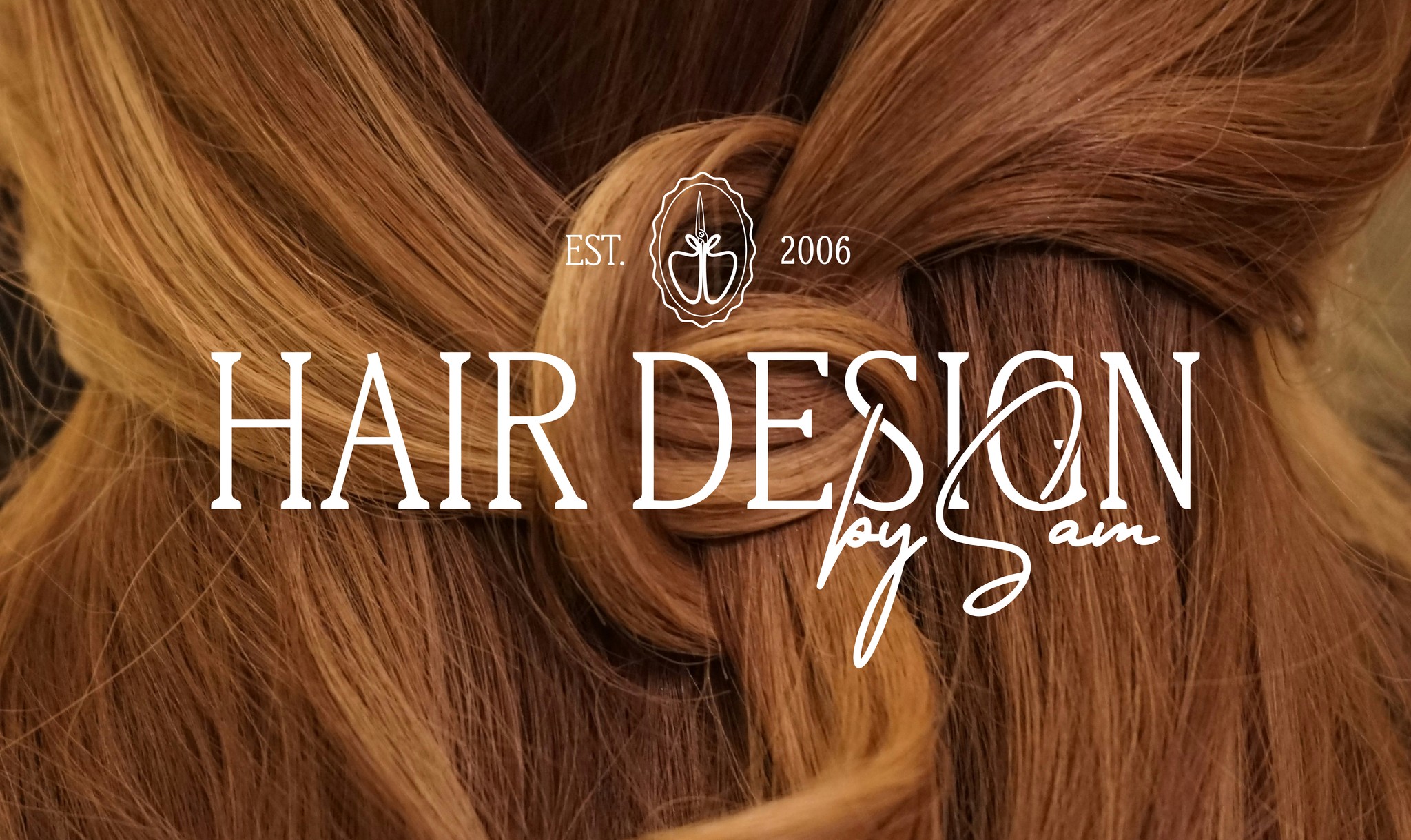 Logo for a luxury hair salon overlayed on an image of ginger hair