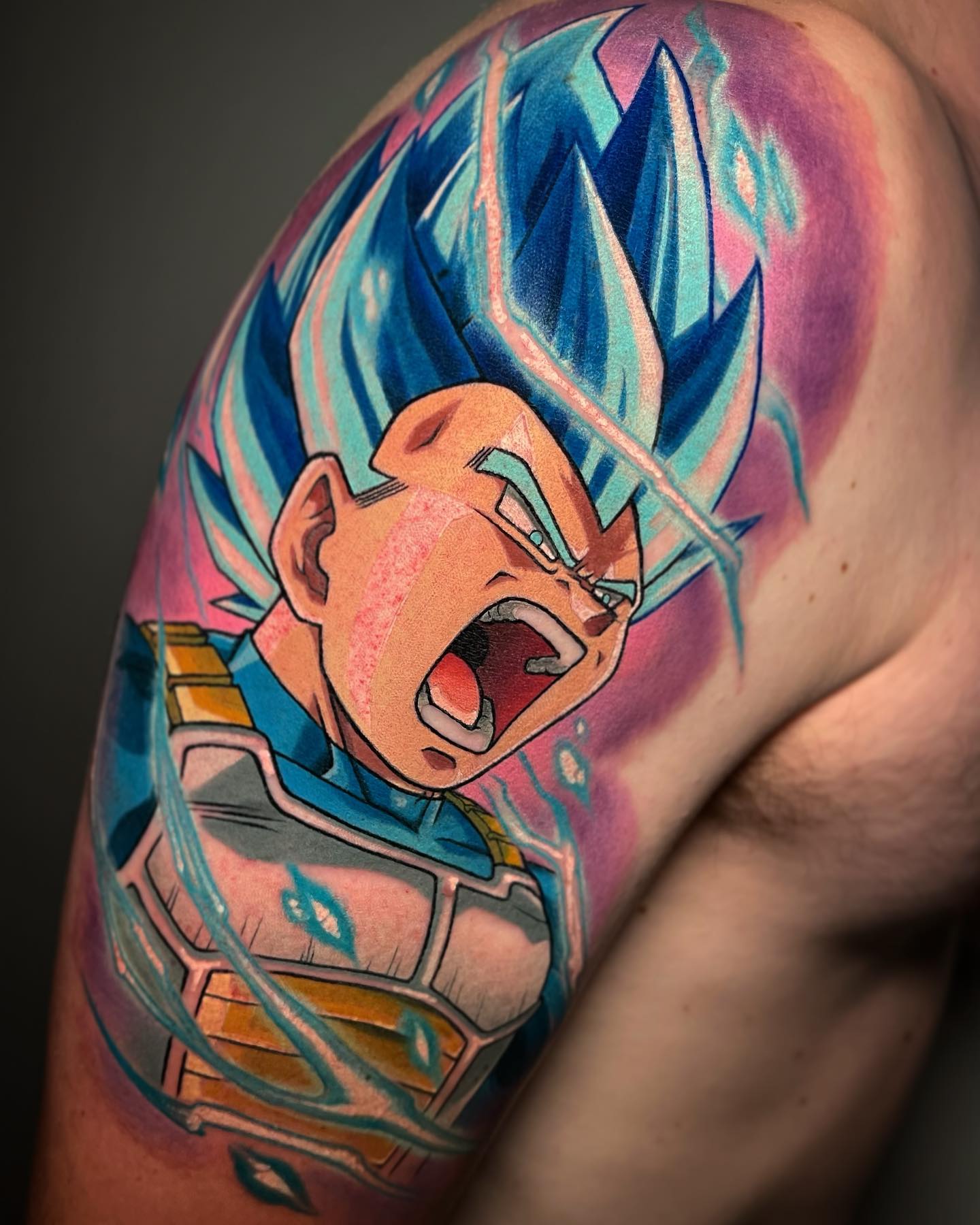 colorful anime tattoo of vegeta in super saiyan god from marcus ottner in wynthall birmingham in england