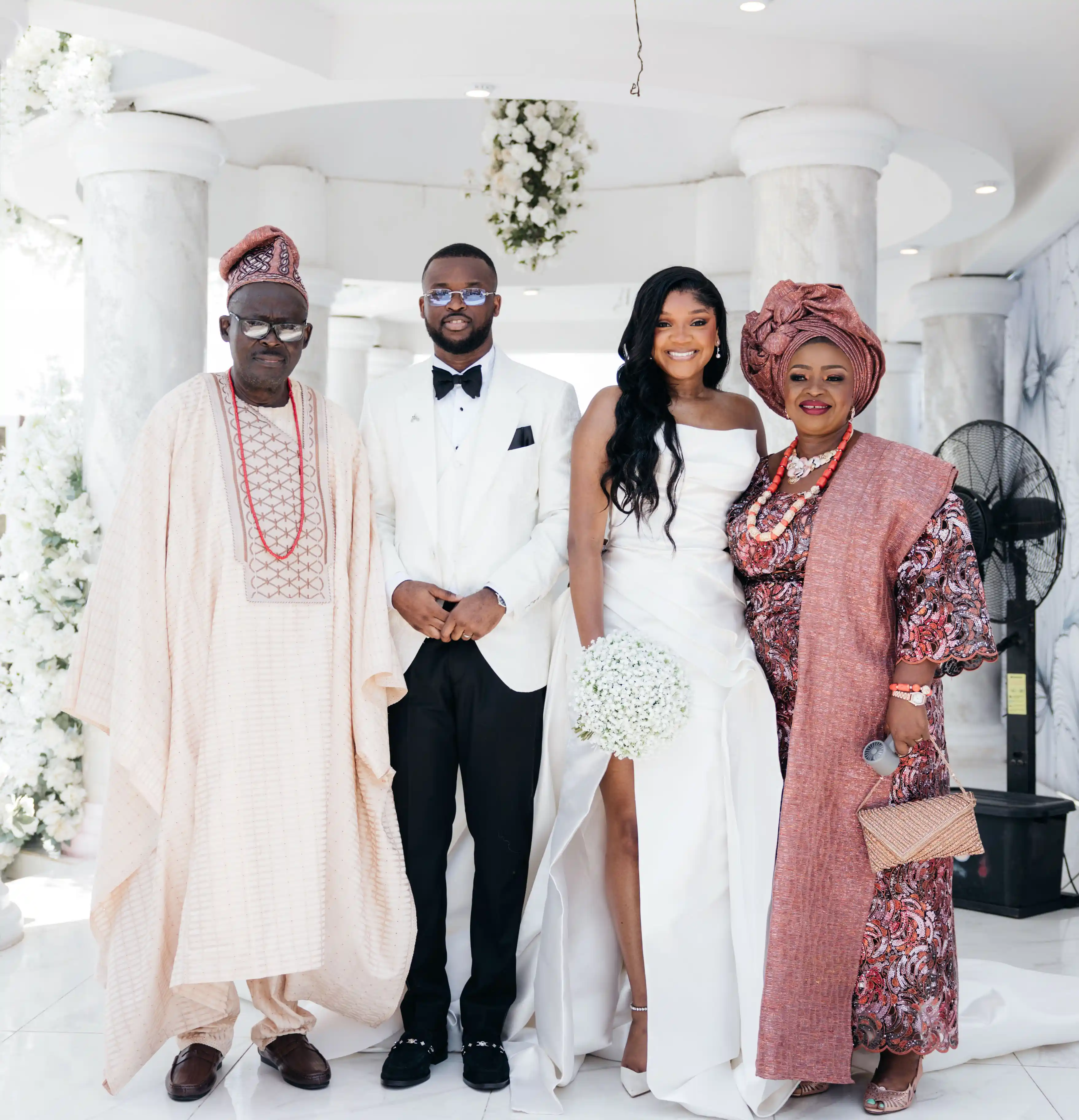 Bride and groom celebrating a luxury wedding coordinated by Victoria Brooks Events, a premium wedding planner in Nigeria.