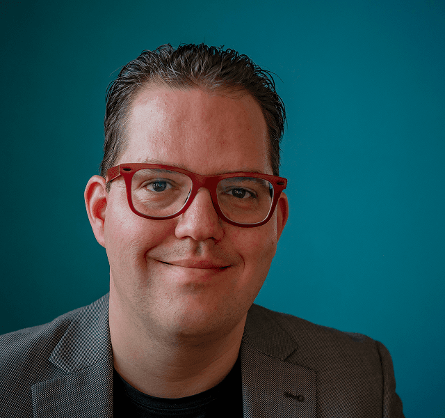 two woman employ talking to each other