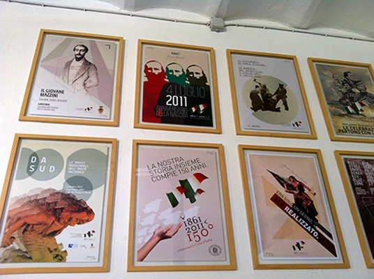 posters framed on a wall