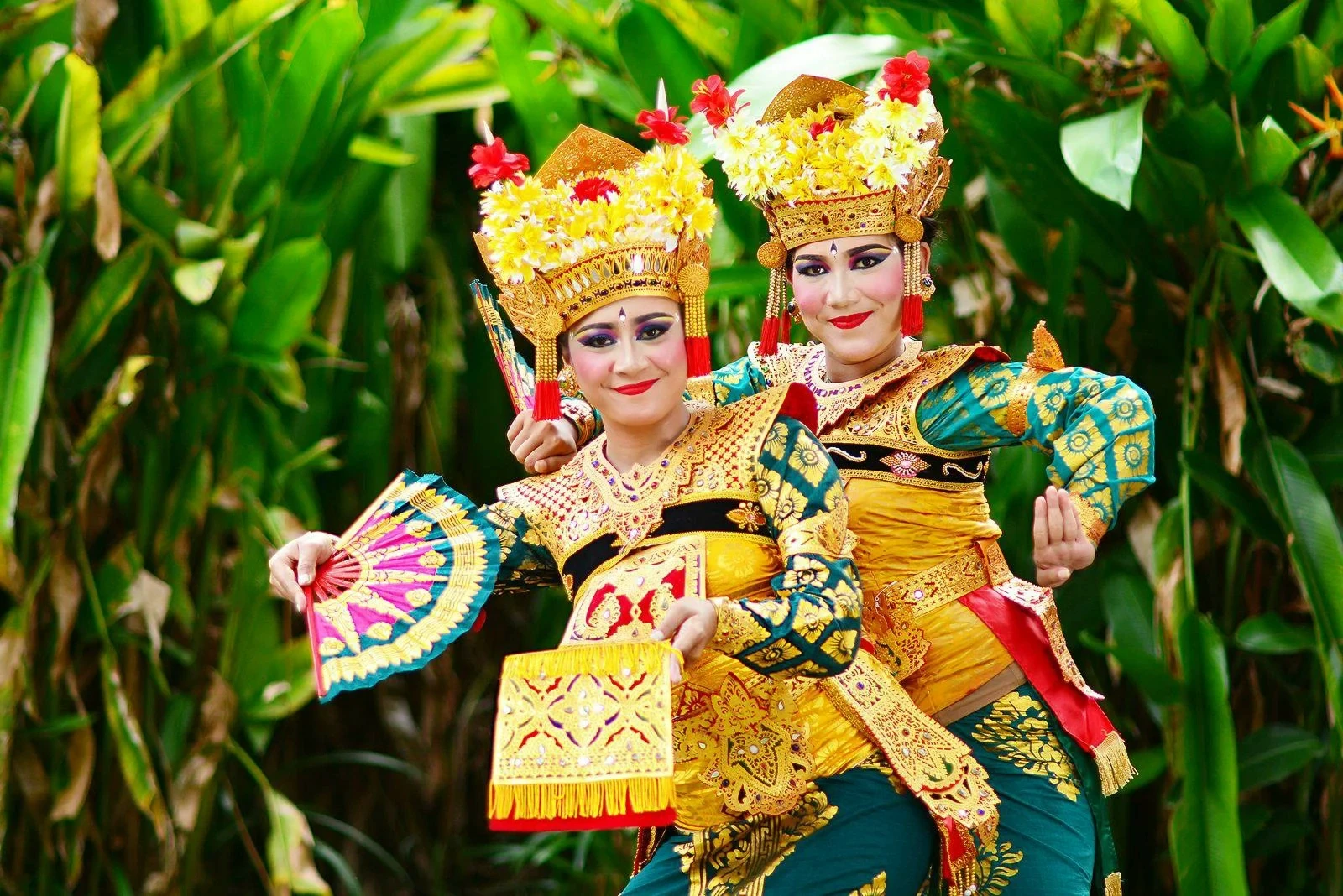 Balinese Legong dancers posing gracefully.