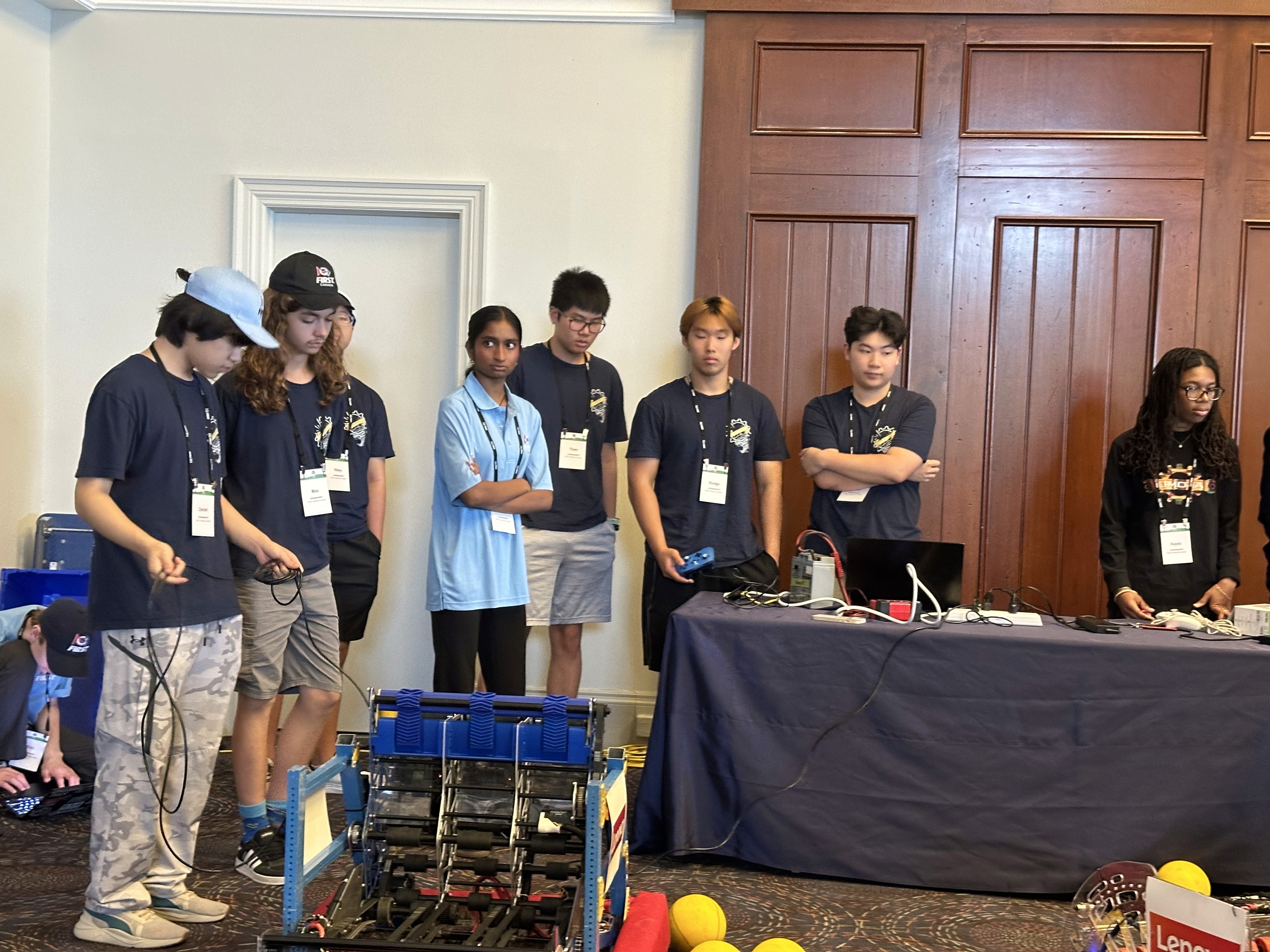 Students from FRC 10015 Bubbles demonstrate our 2026 robot Ballista to FIRST Canada sponsors at the Angus Glen Golf event.