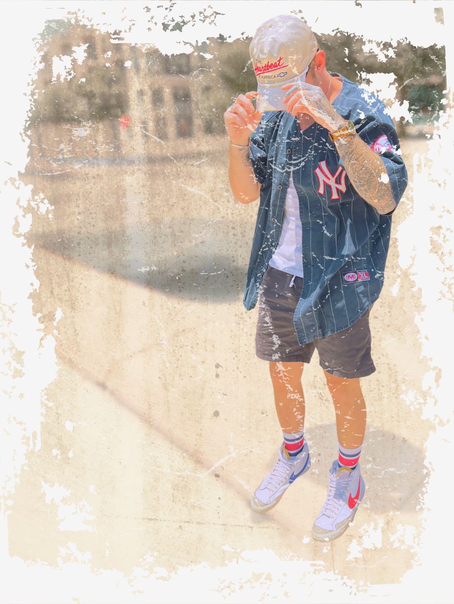 Girl is sitting on a gate