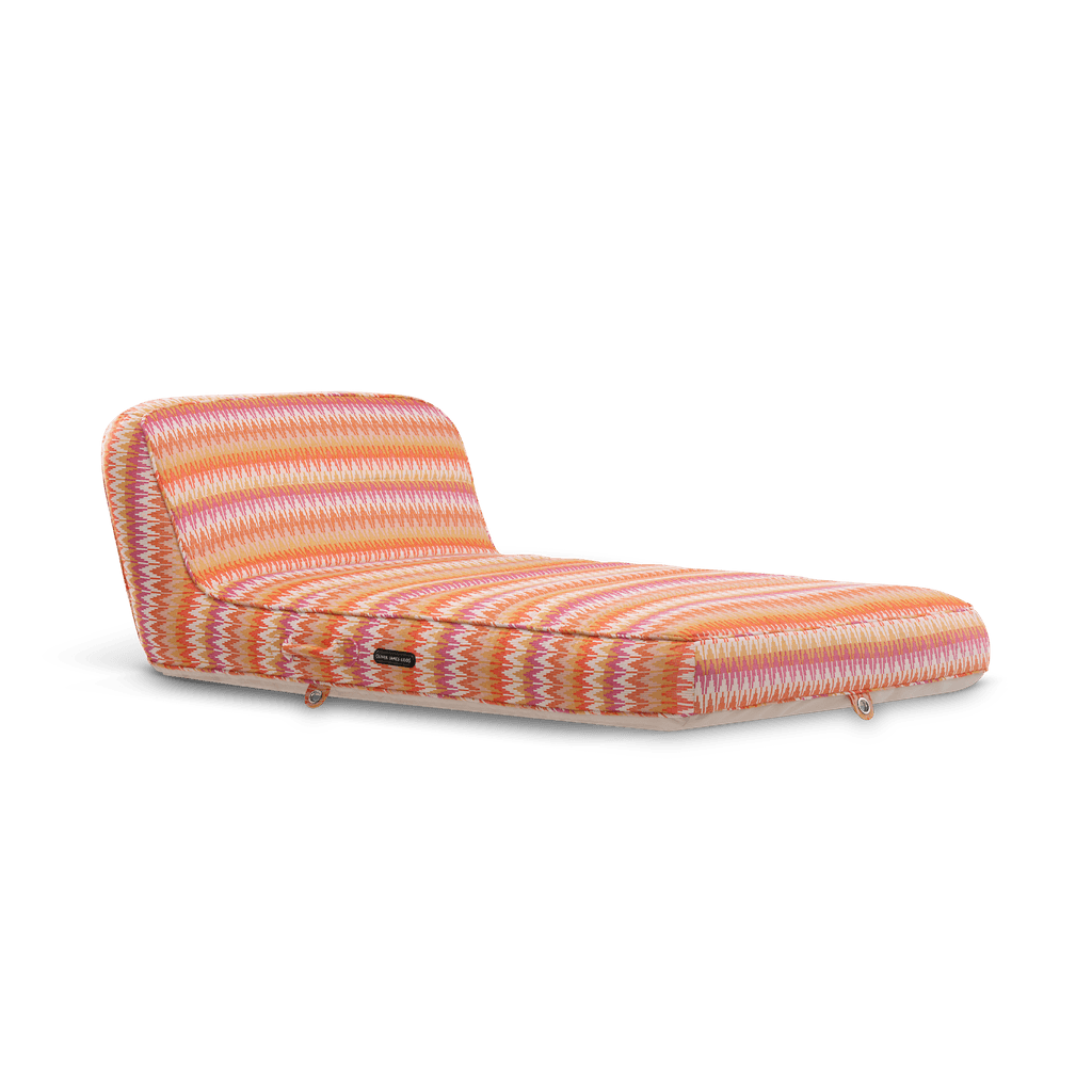 Luxury single pool float in vibrant sunset-coloured chevron weave