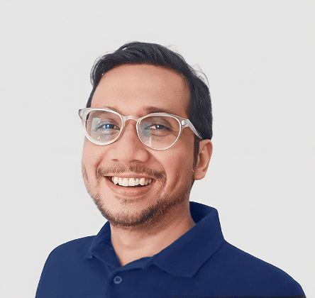 smiling woman wearing white and black pinstriped collared top