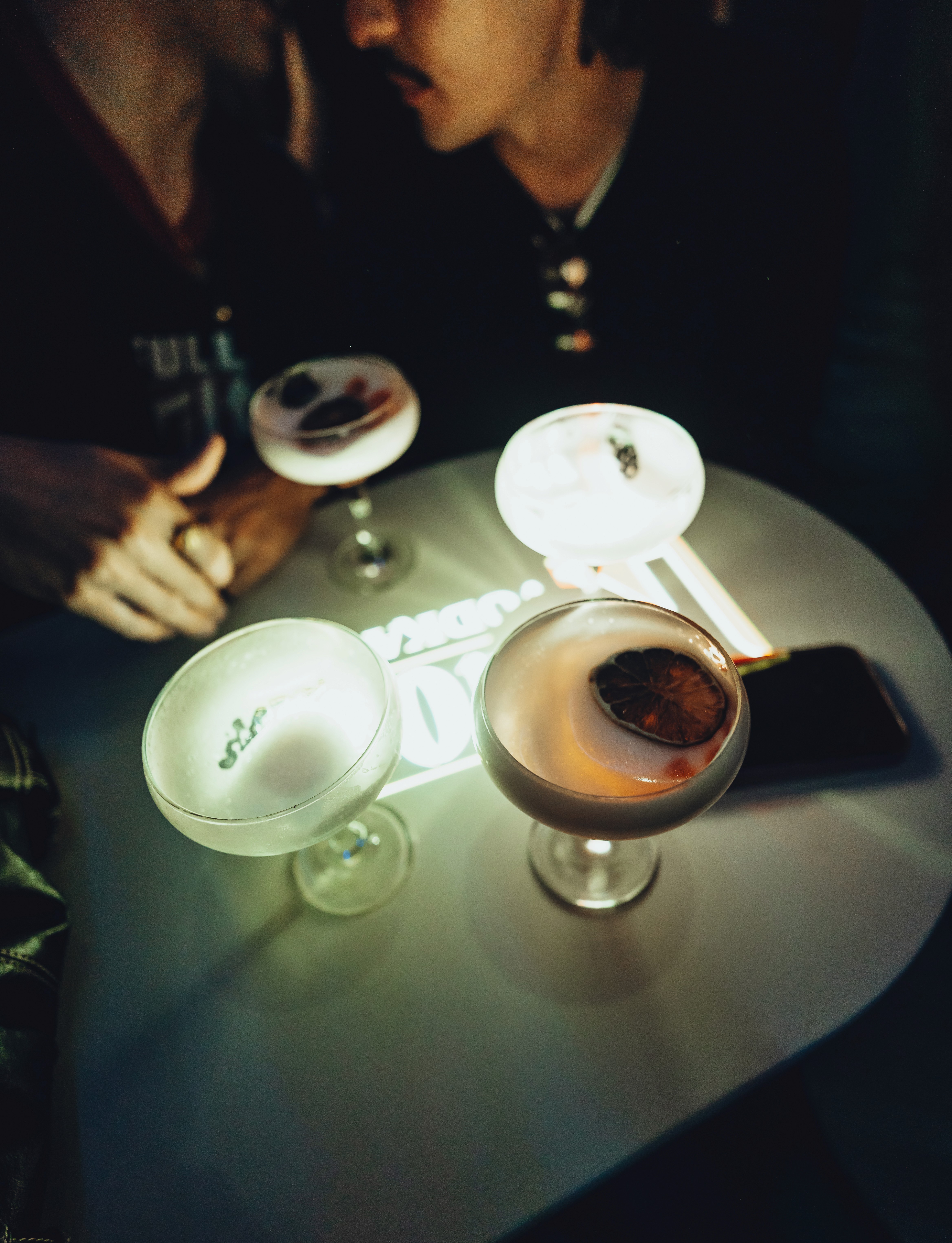 Streetside billboard with flyposters of the Batch.Works brand and illustrations