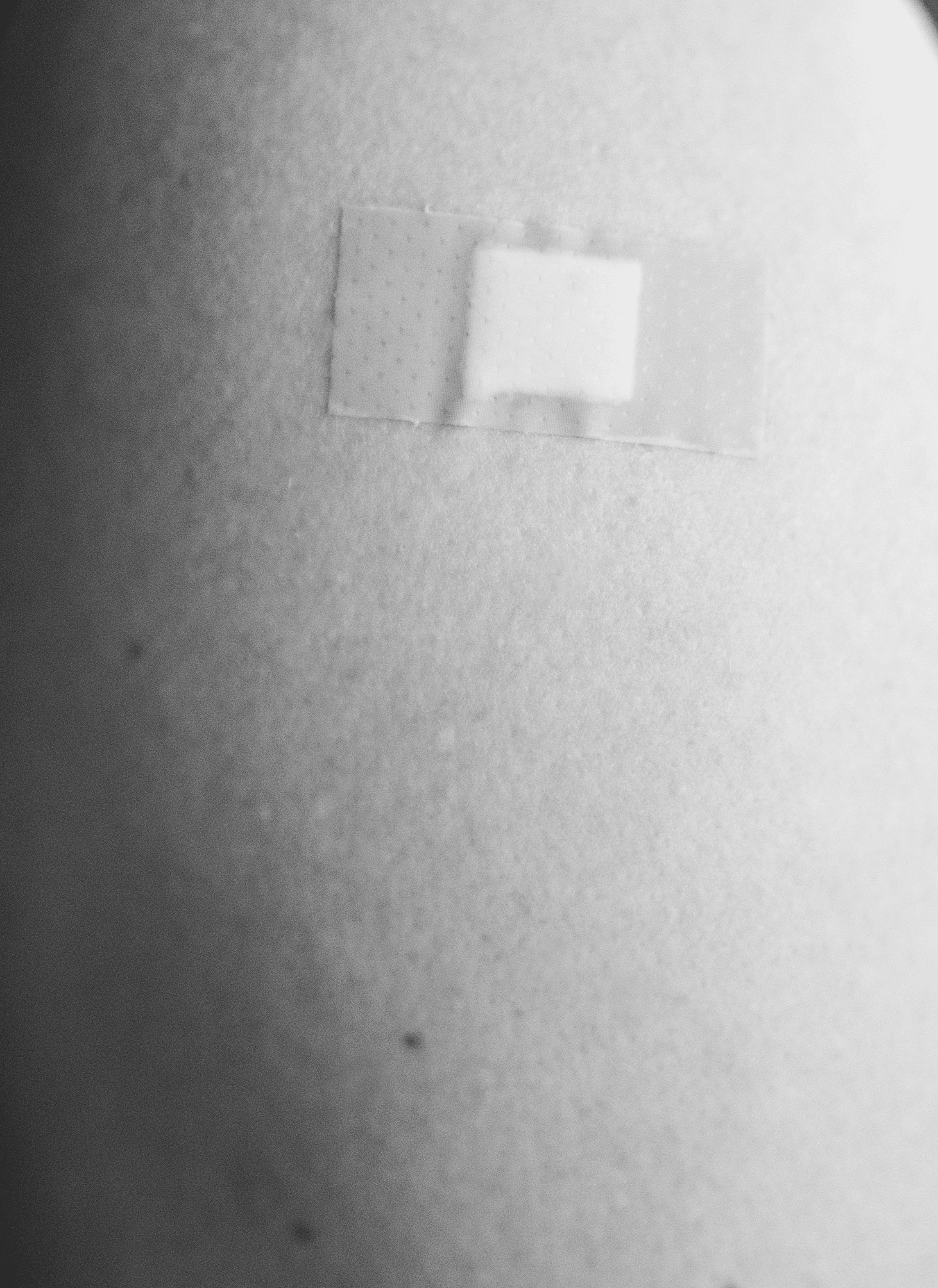 grayscale photo of woman in tank top