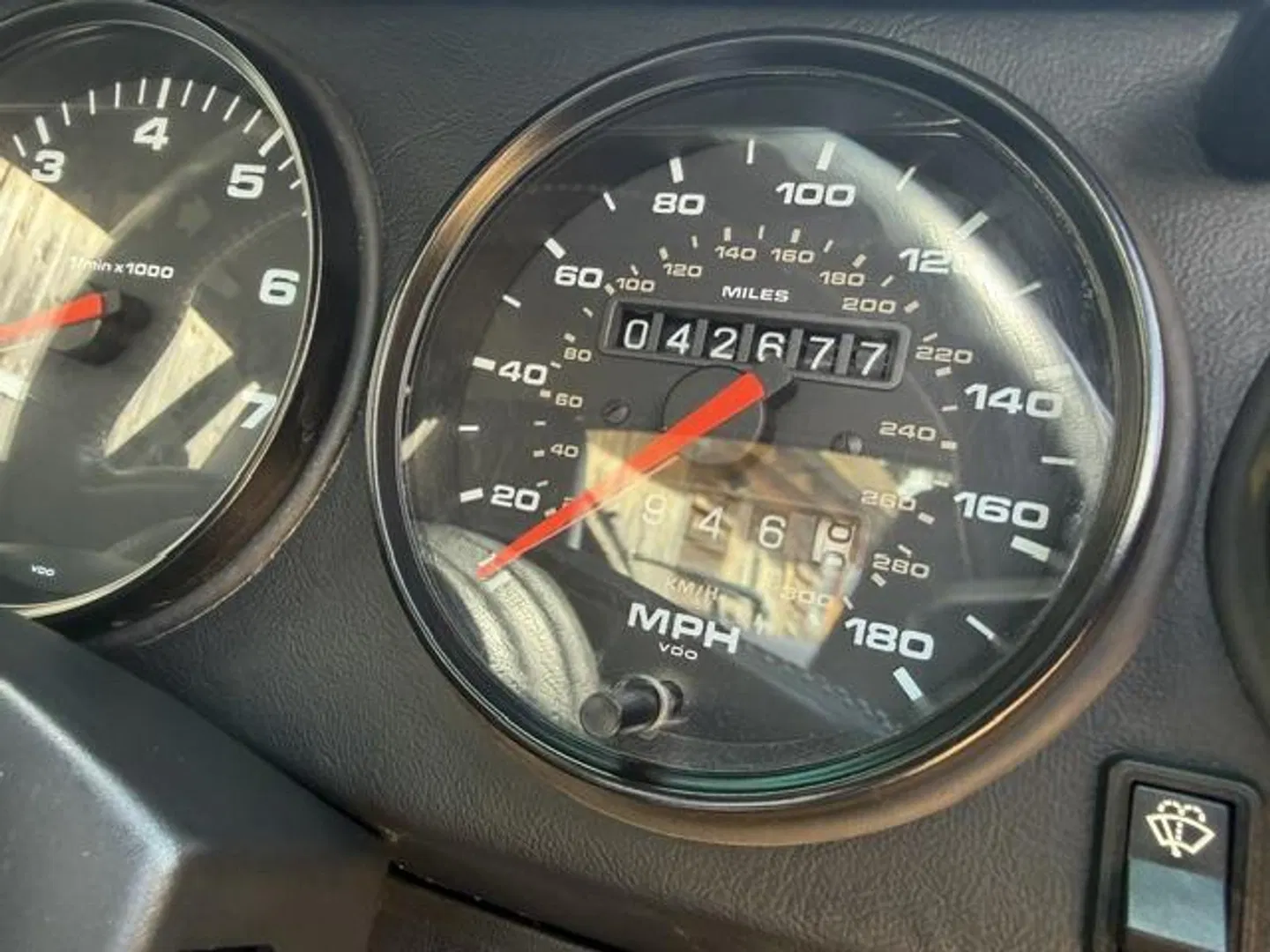 Speedometer reading 42,677 miles alongside the rev counter