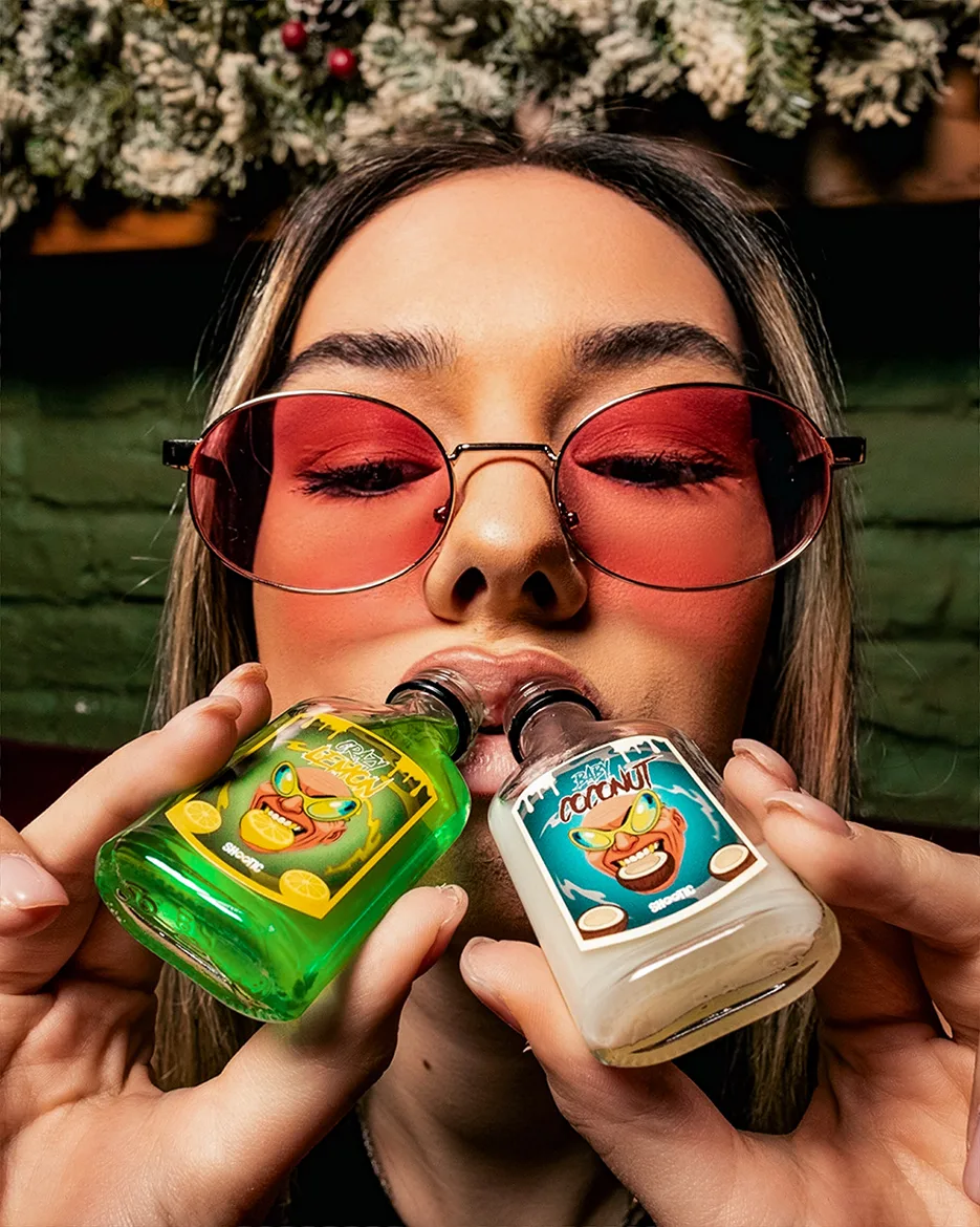 man in red shirt riding bicycle on road during daytime