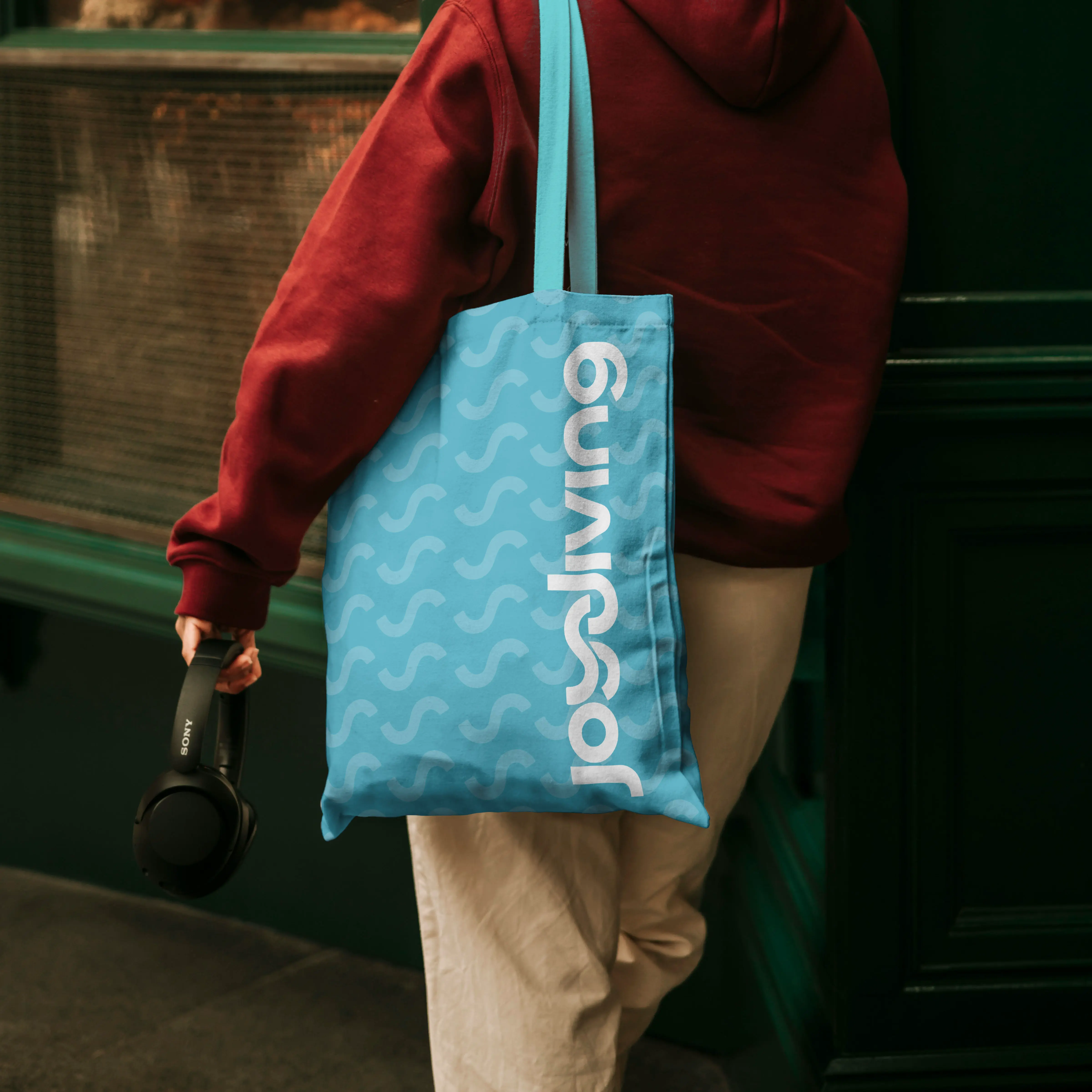 image of a guy carring a tote bag