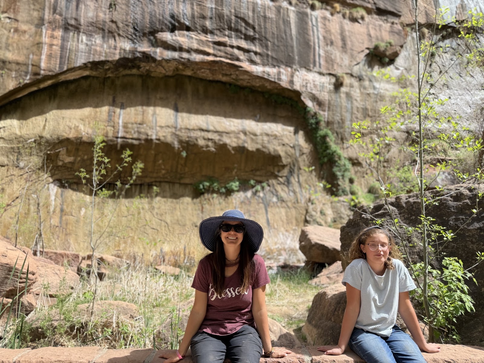 Brittney and Eden at a rock formation in Zion National Park