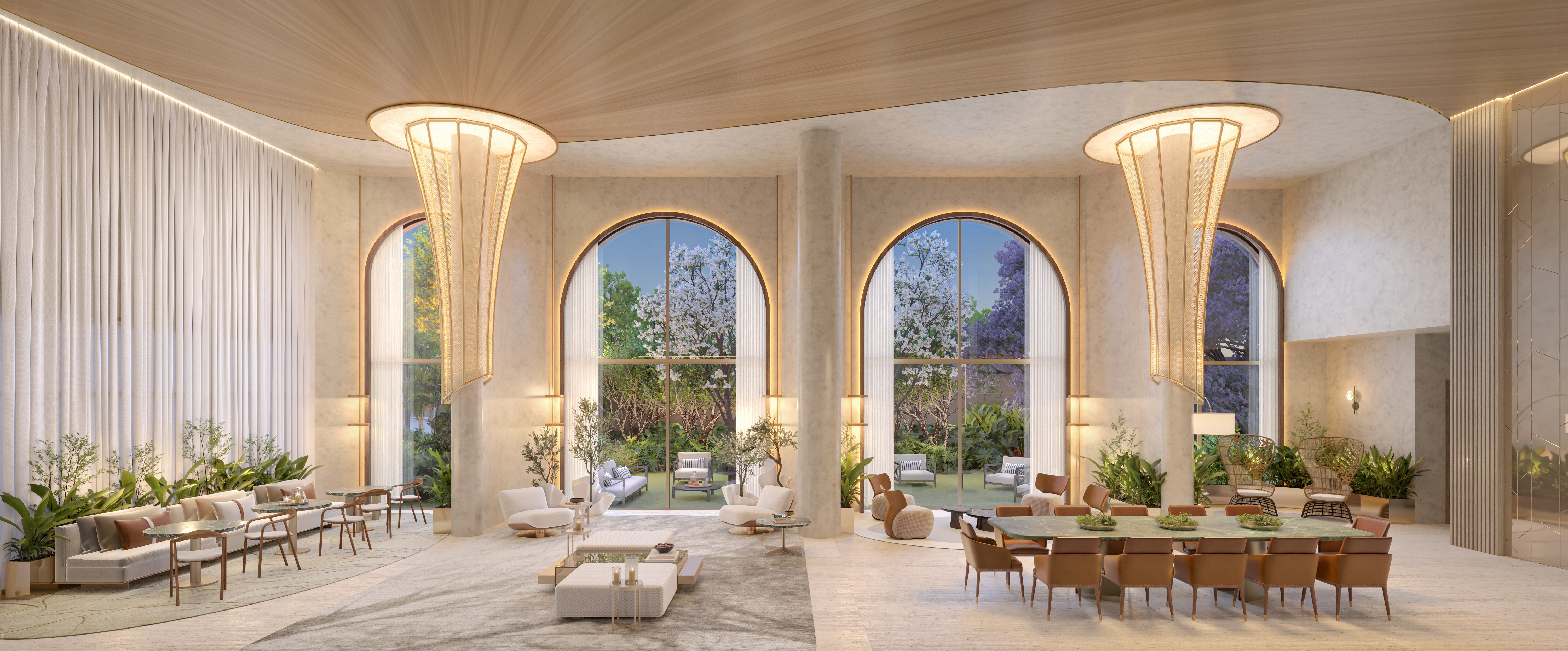 Curved modern skyscraper against a clear blue sky.