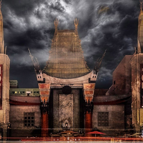 Nighttime photo of the TCL Chinese Theatre with spooky clouds overhead