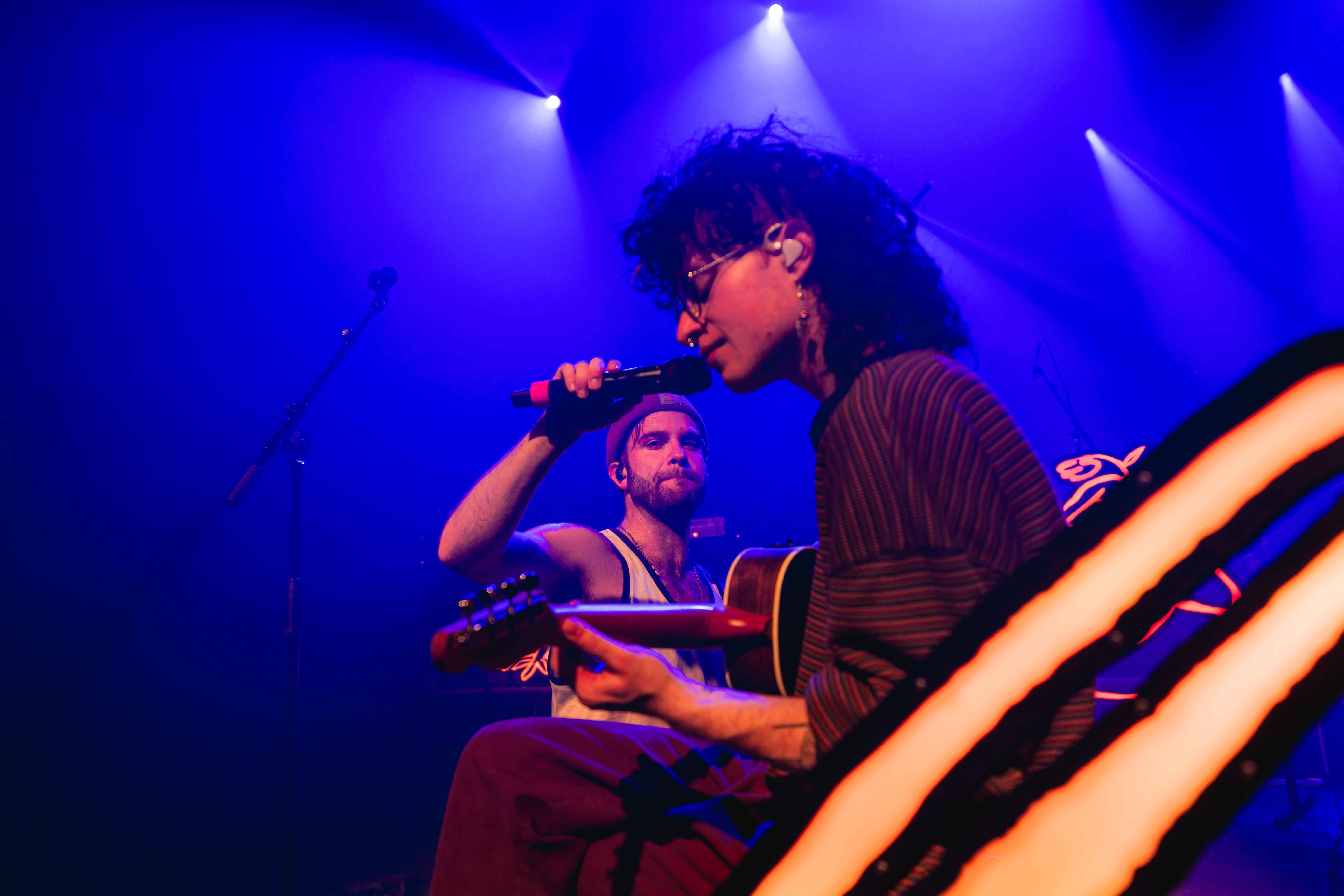 one artist holding the mic for another, Cavetown in Copenhagen