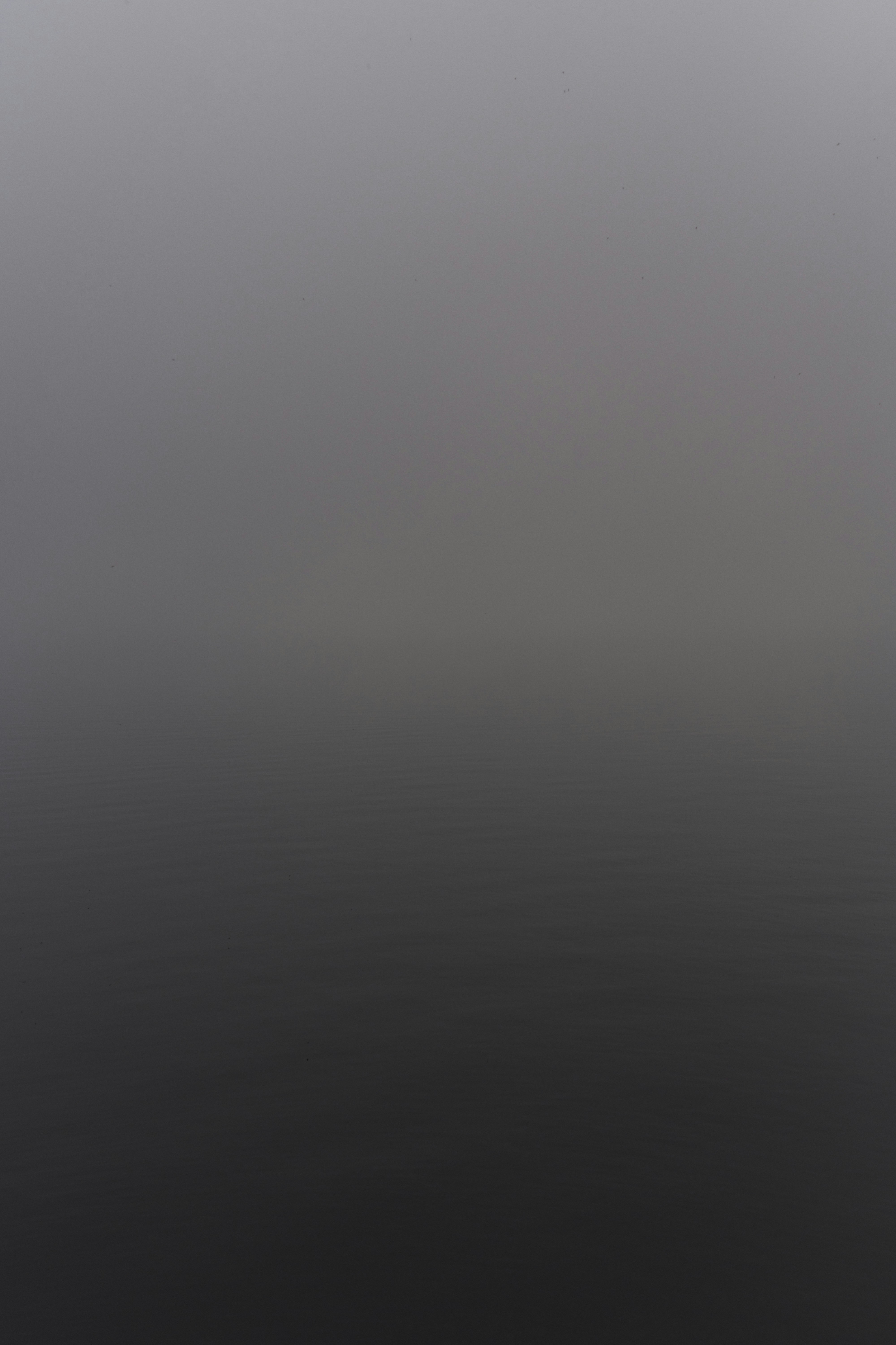 A gray gradient from light to dark