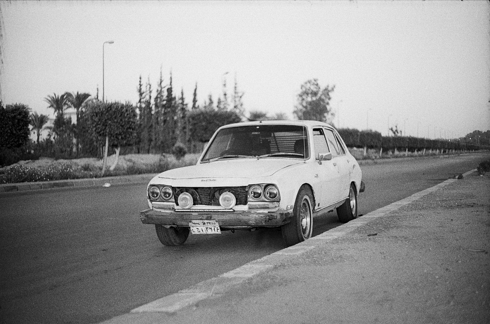 White Car by the Kerb