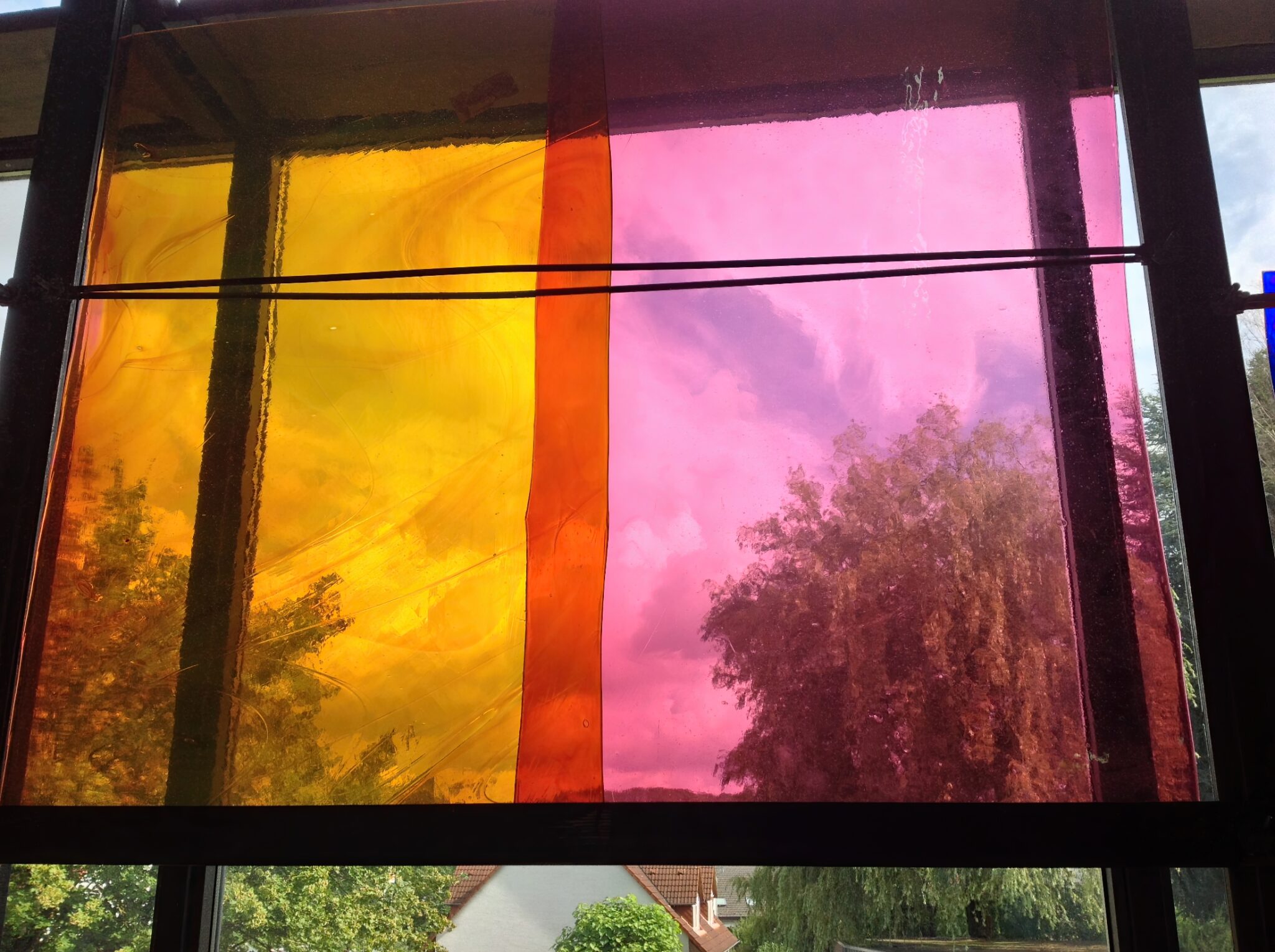 Yellow and gold-pink glass samples in the viewing tower at Derix Glasstudios