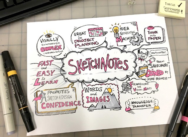 Abstract bronze sculpture in a park setting