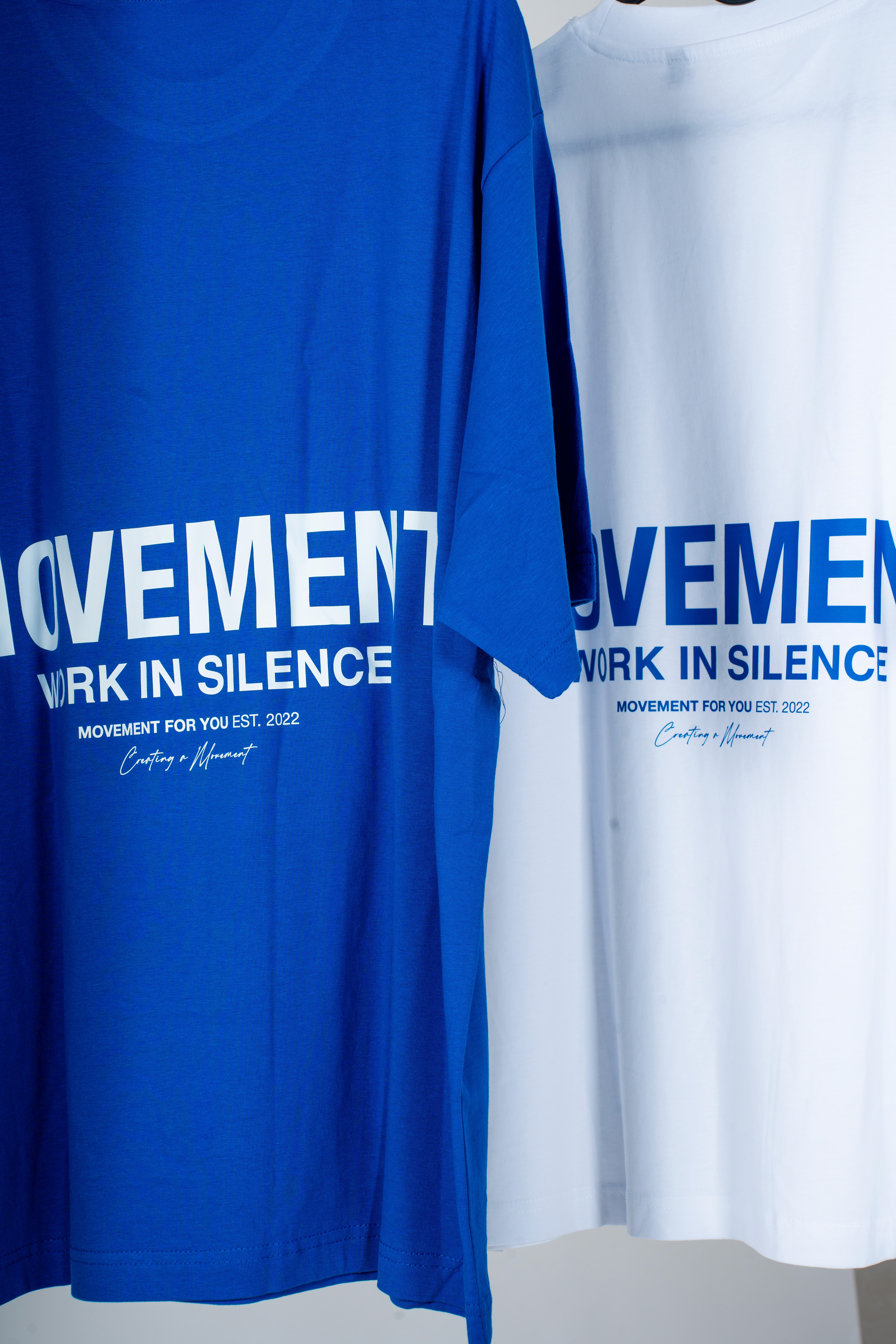  A woman in a helmet with a light trail, suggesting movement or speed in a dynamic outdoor setting.