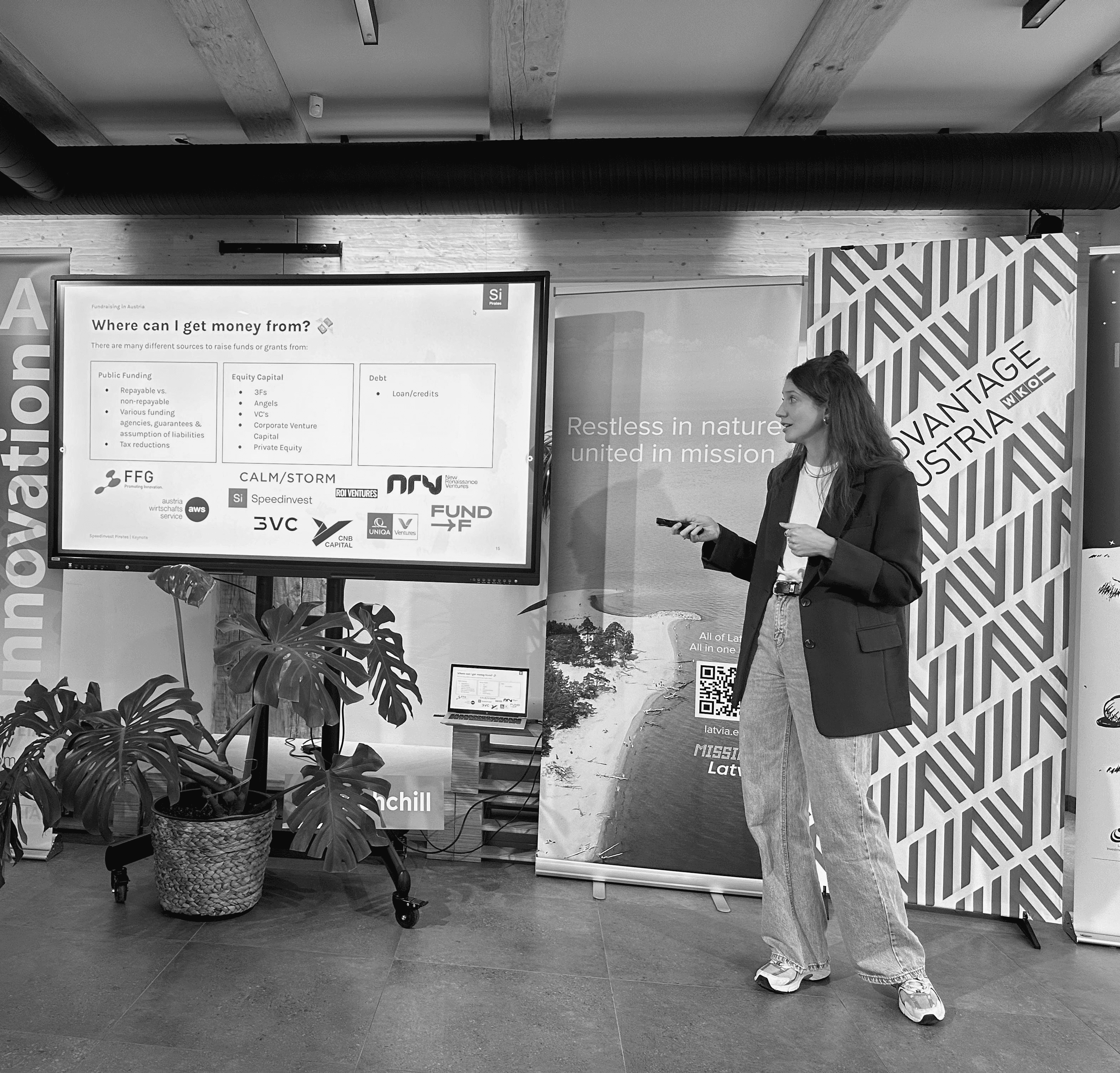 woman giving a presentation about fundraisign