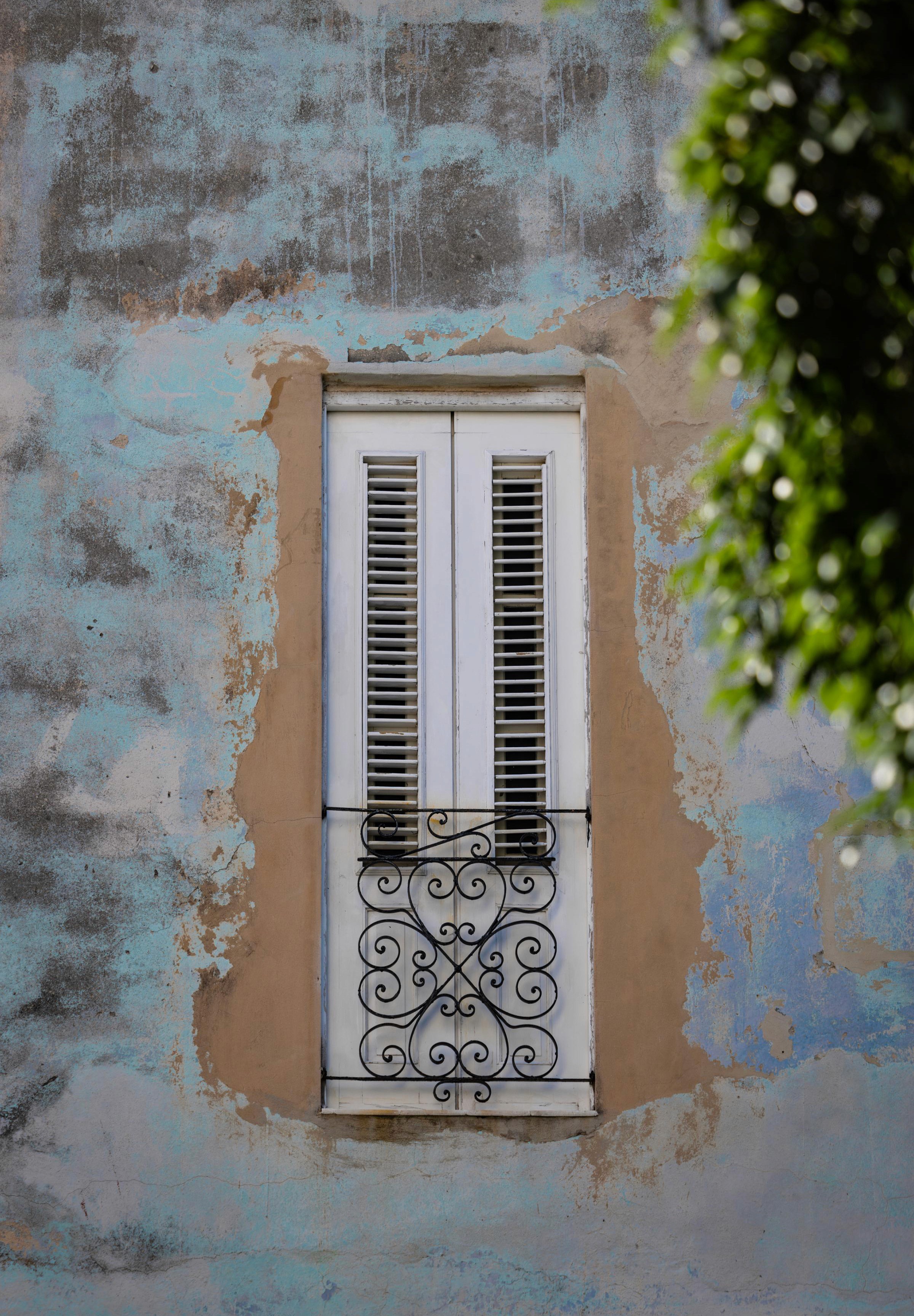 Elegant old windowsill/door with forged grille - Havana, Cuba