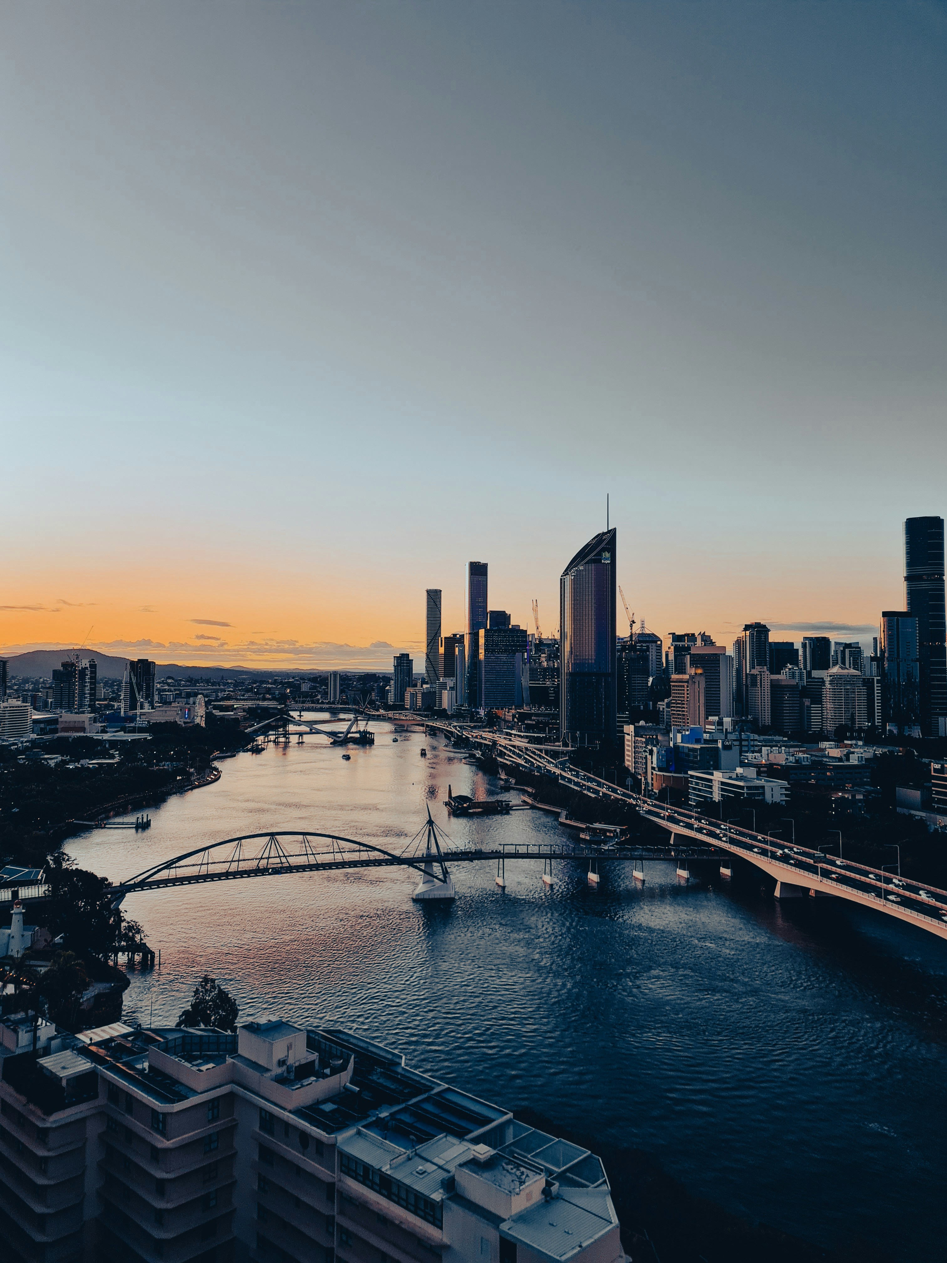 a city with a river and a bridge
