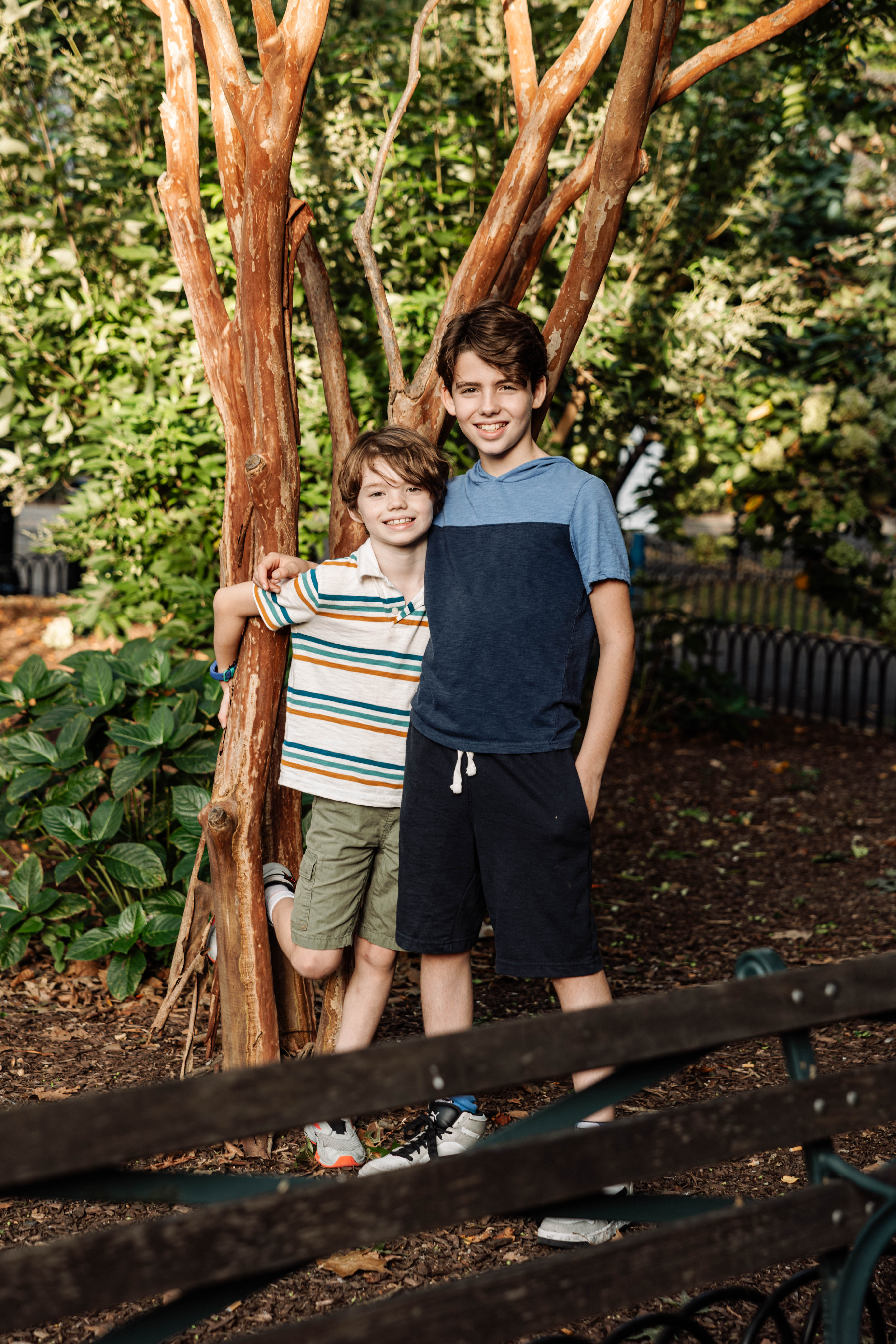 6:44 PMTwo brothers sharing a candid moment in Stuyvesant Town and Peter Cooper Village, NYC — natural, playful children's and family photography by Lizz Spano Photography, New York City family photographer.