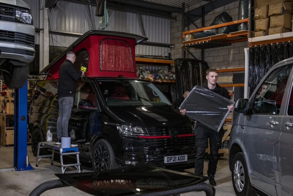window fitting a campervan at cosmic campervan conversions