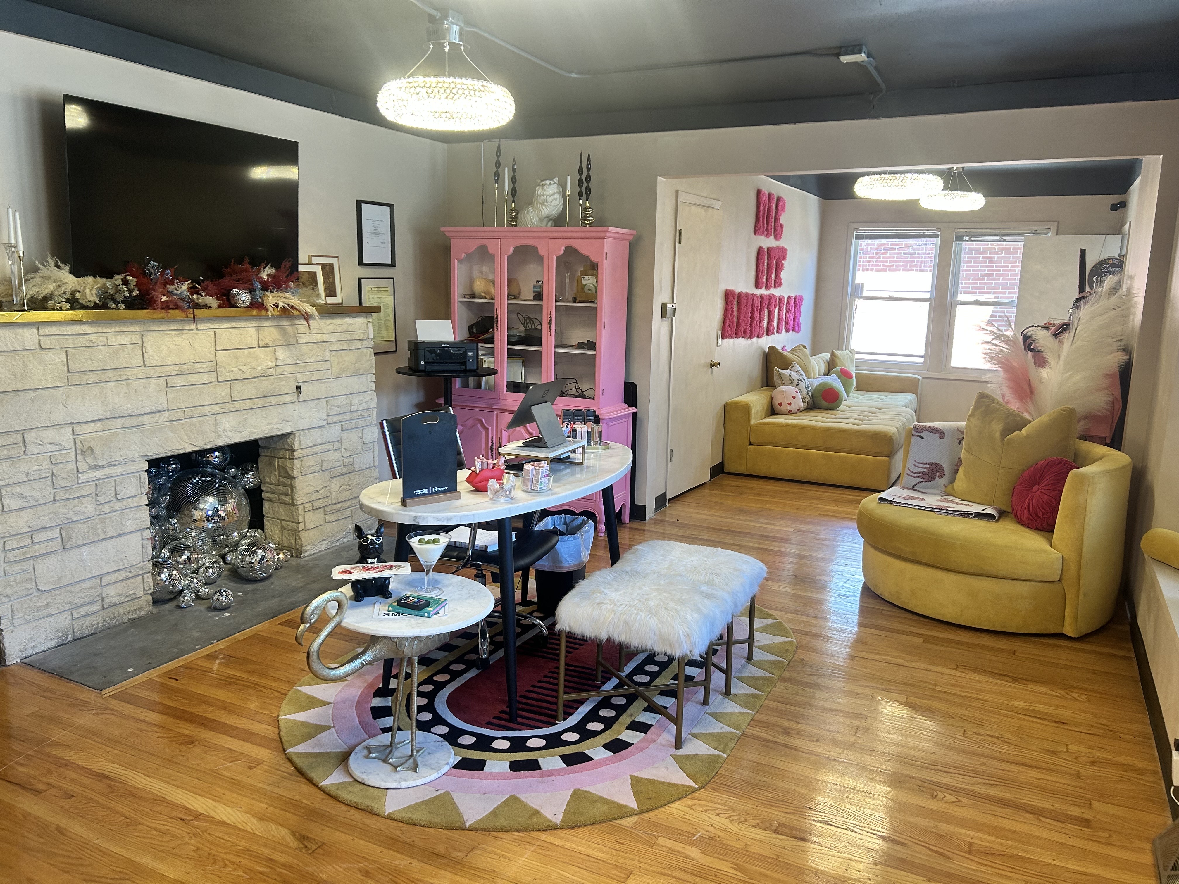 Lobby of Grand Entrance Tattoo with modern decor and artwork