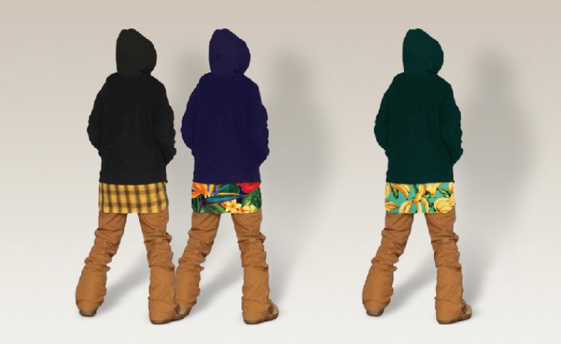 Three hooded jackets are displayed against a plain off-white background, viewed from behind. The jacket on the left is black, the center is blue, and the rightmost is dark green. Each jacket features a hood, a front zipper, and a hood lining. The jackets are worn over patterned shirts and brown pants.
