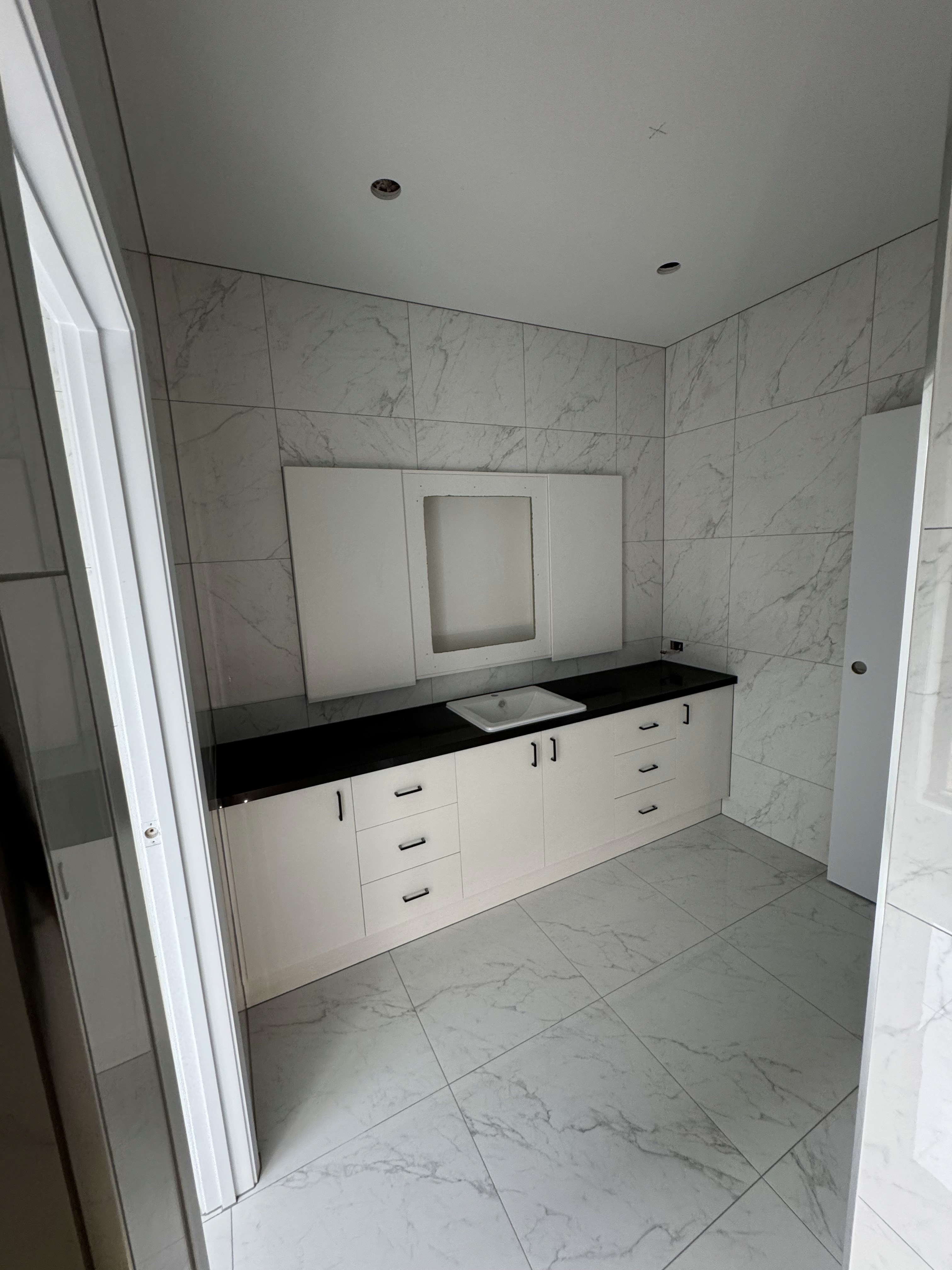 Bathroom wall and floor tiling