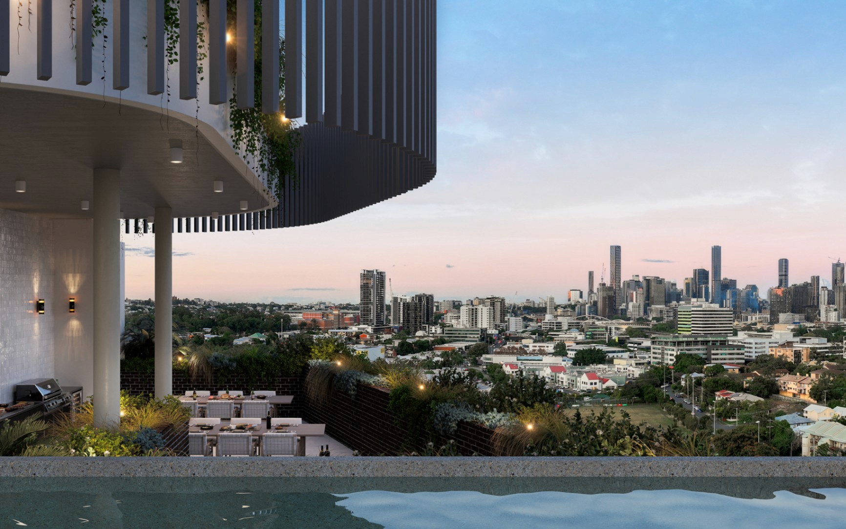 Luxury rooftop amenities at The Adler overlooking Brisbane, highlighting off-the-plan apartments you can buy with $10k through Coposit.