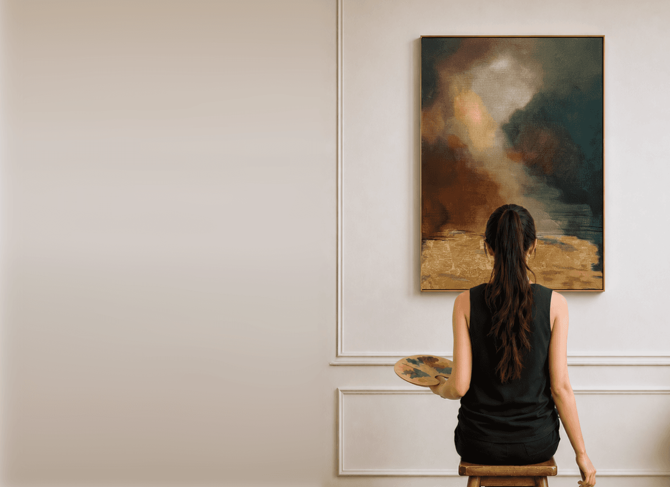 Person viewing a framed painting of a woman’s face with blue bird wings and a parrot in an art gallery.