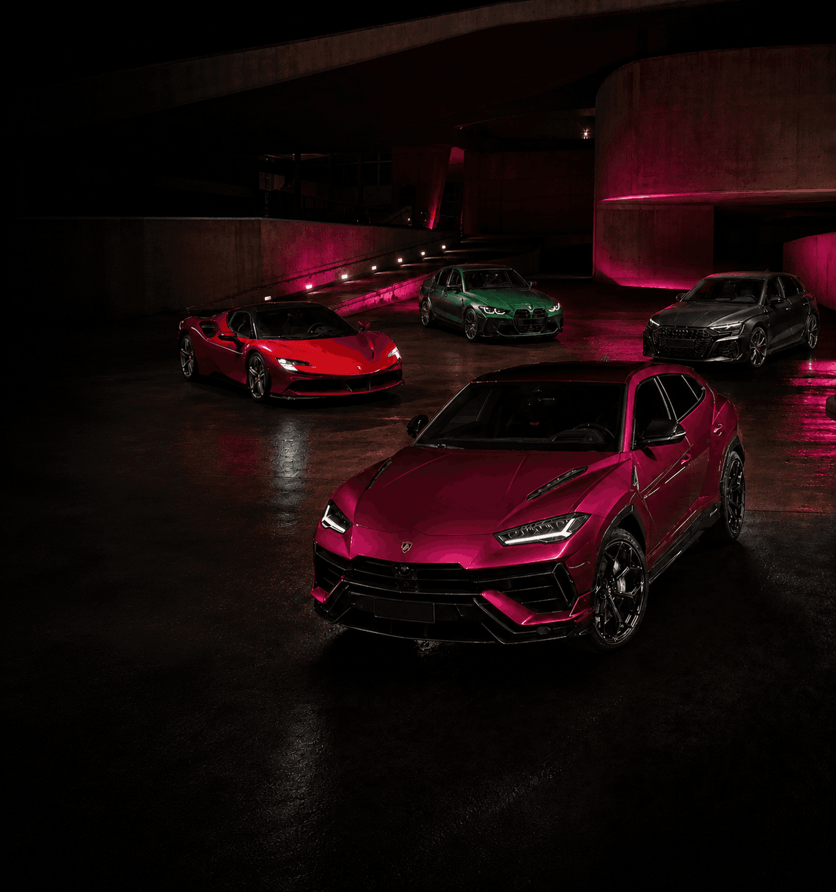 Premium performance vehicles in a dark studio environment