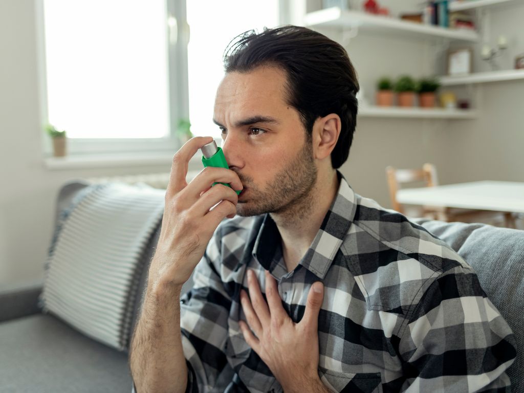 a man wearing a oxygen mask