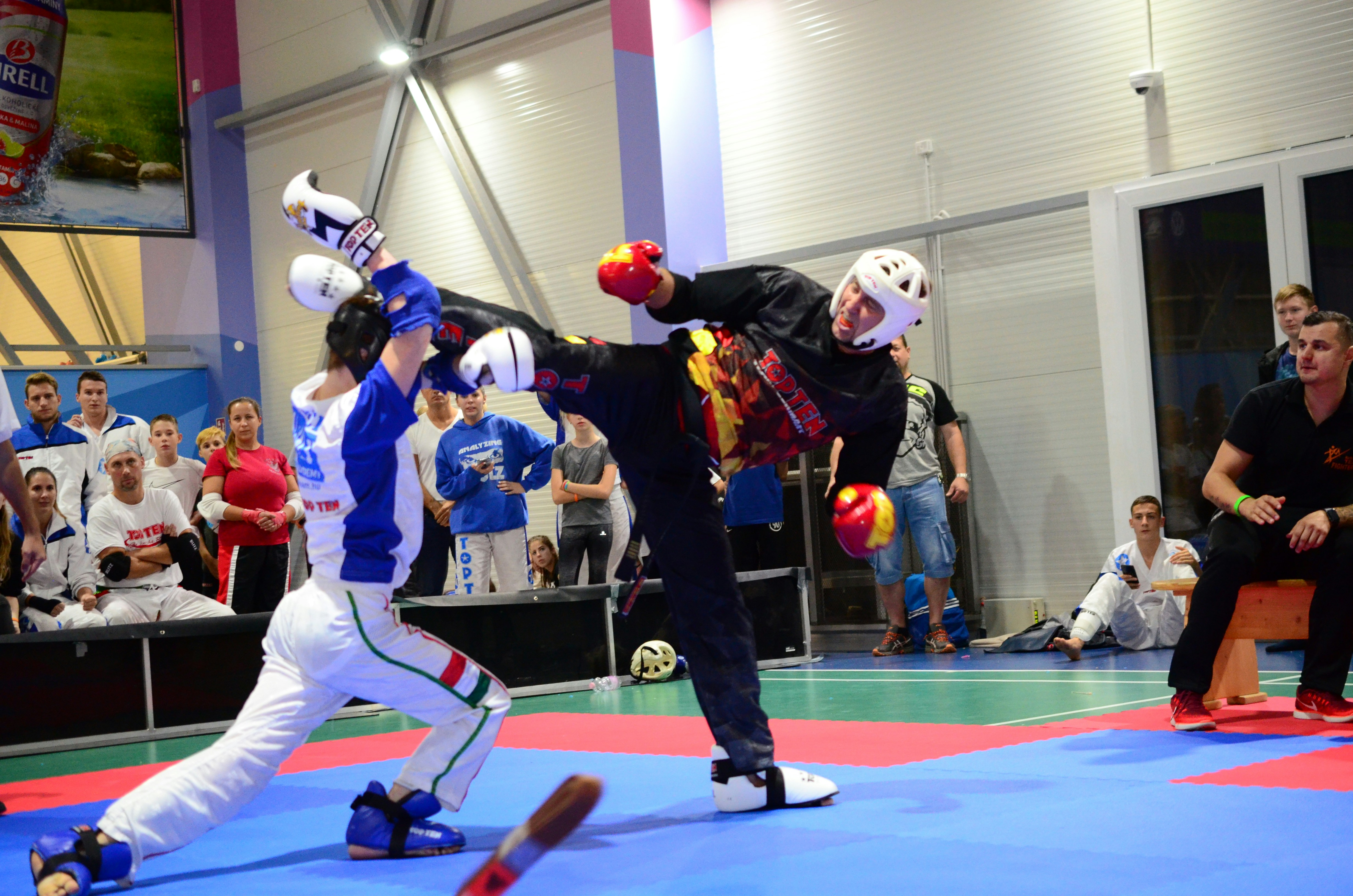 Two fighters competing in a martial arts match