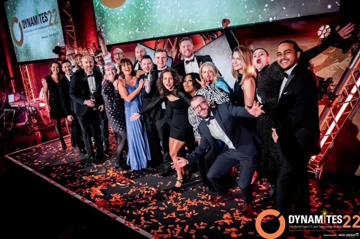 Photo of opencast employees on stage posing for the camera when receiving the award
