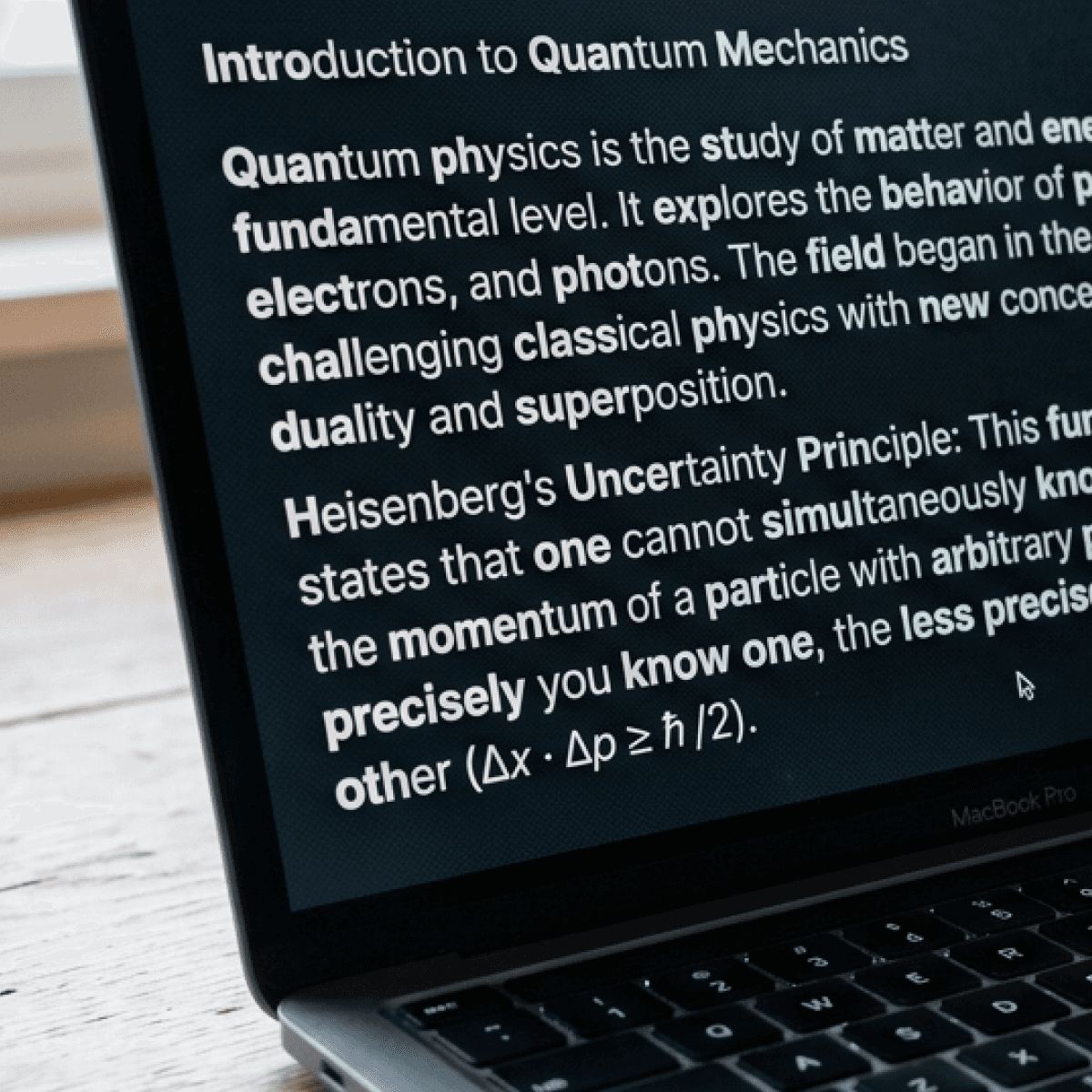 A laptop with text written in focus reading - bionic format